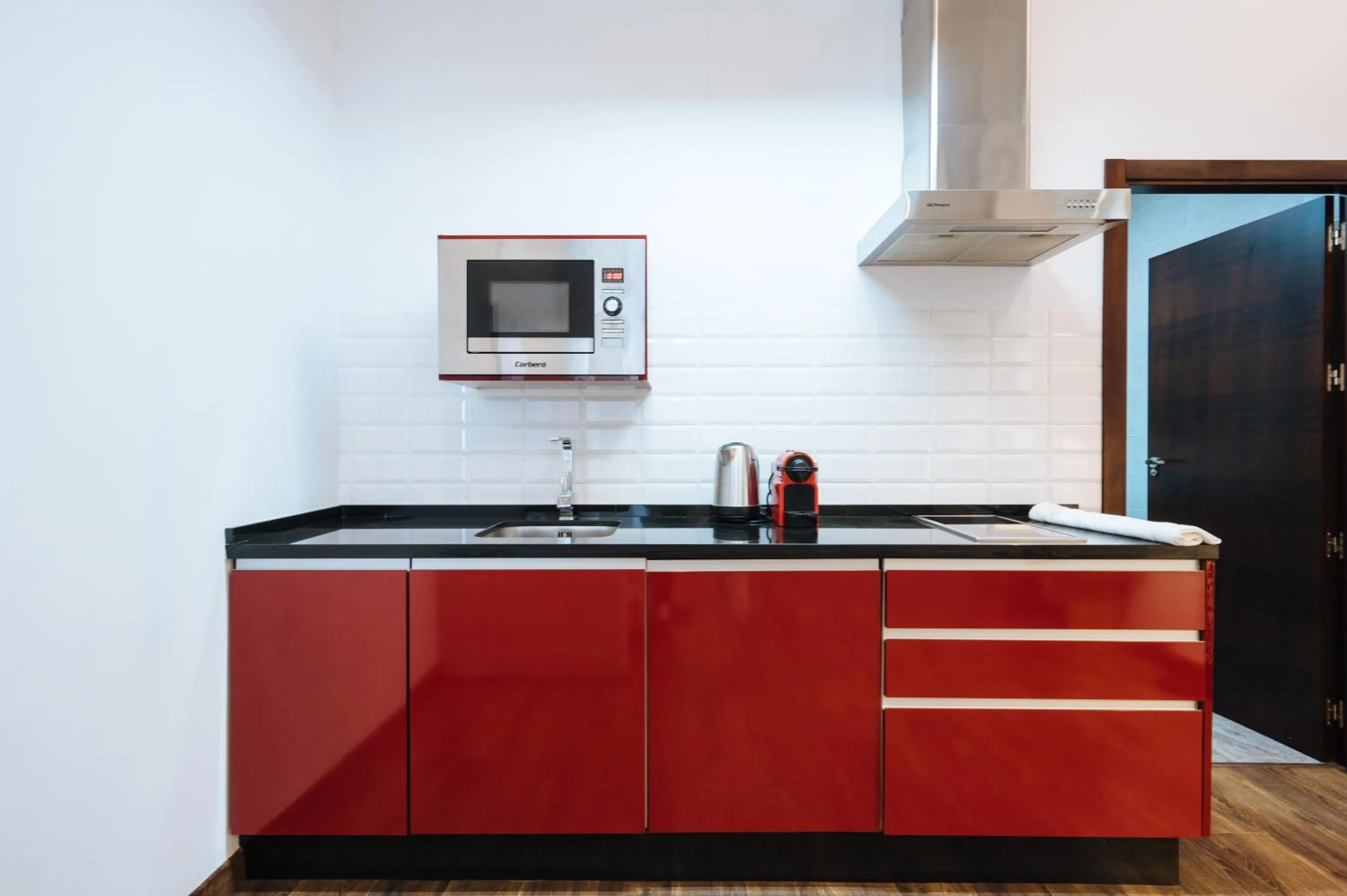 Kitchen or kitchenette in Apartamentos "El Escondite de María"