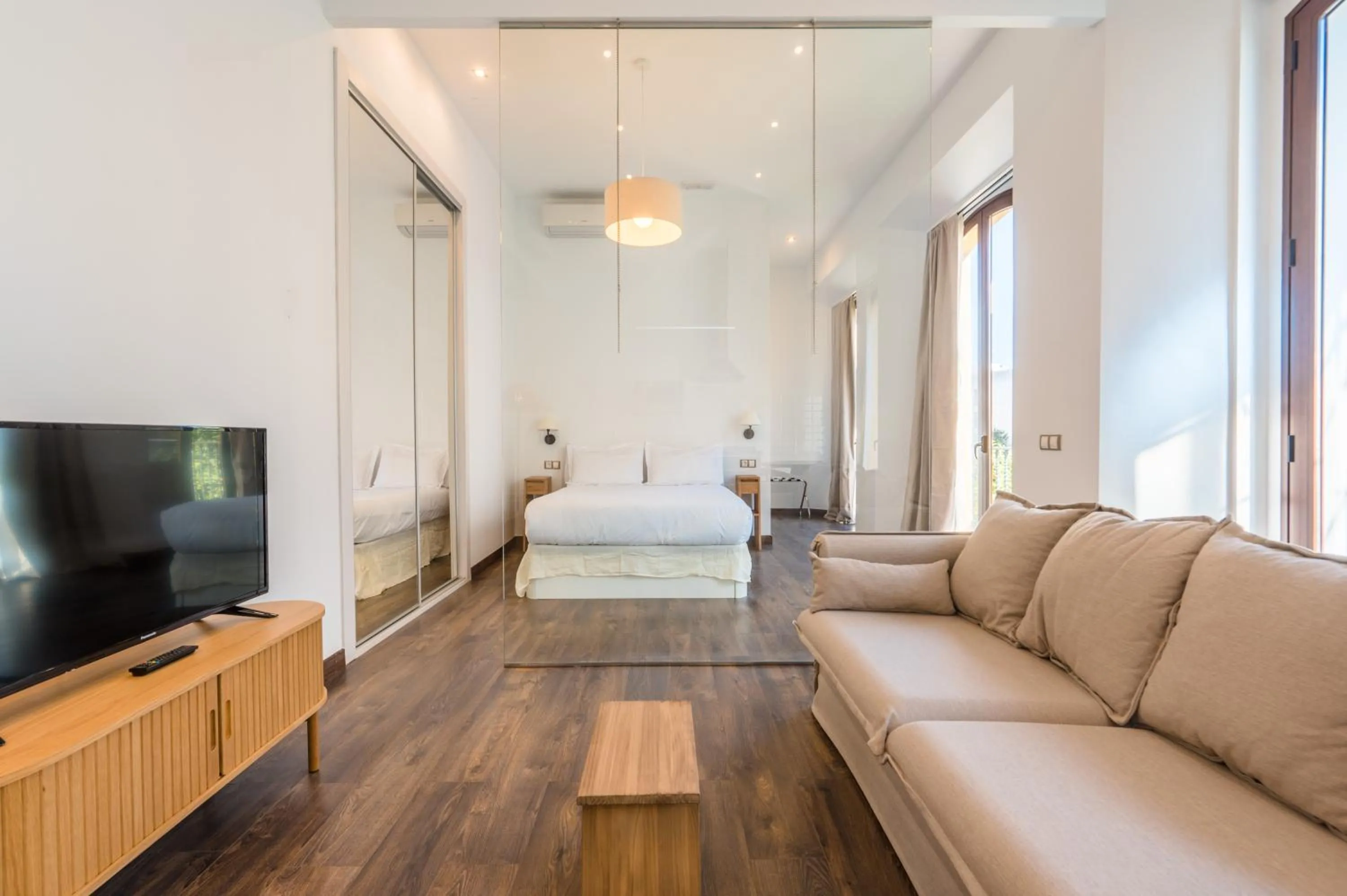 Communal lounge/ TV room, Bed in Apartamentos "El Escondite de María"