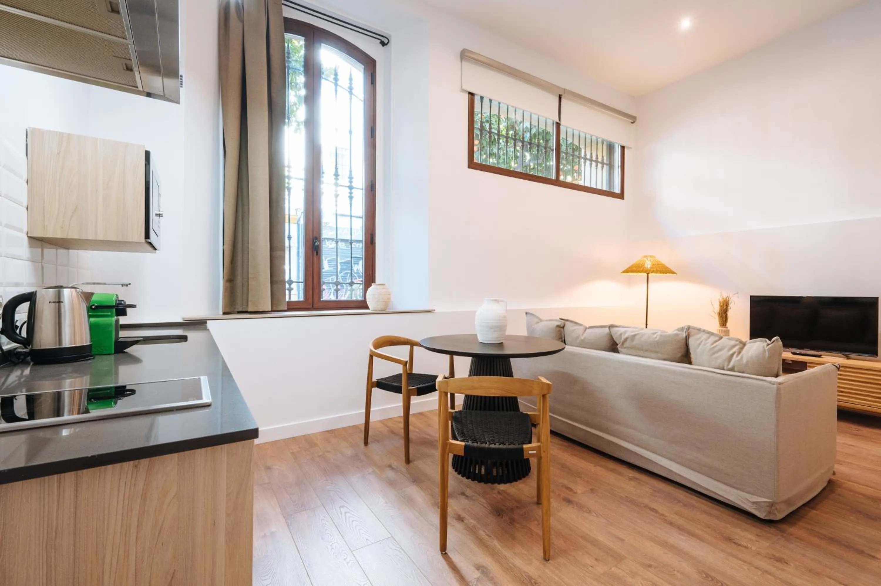 Kitchen or kitchenette in Apartamentos "El Escondite de María"
