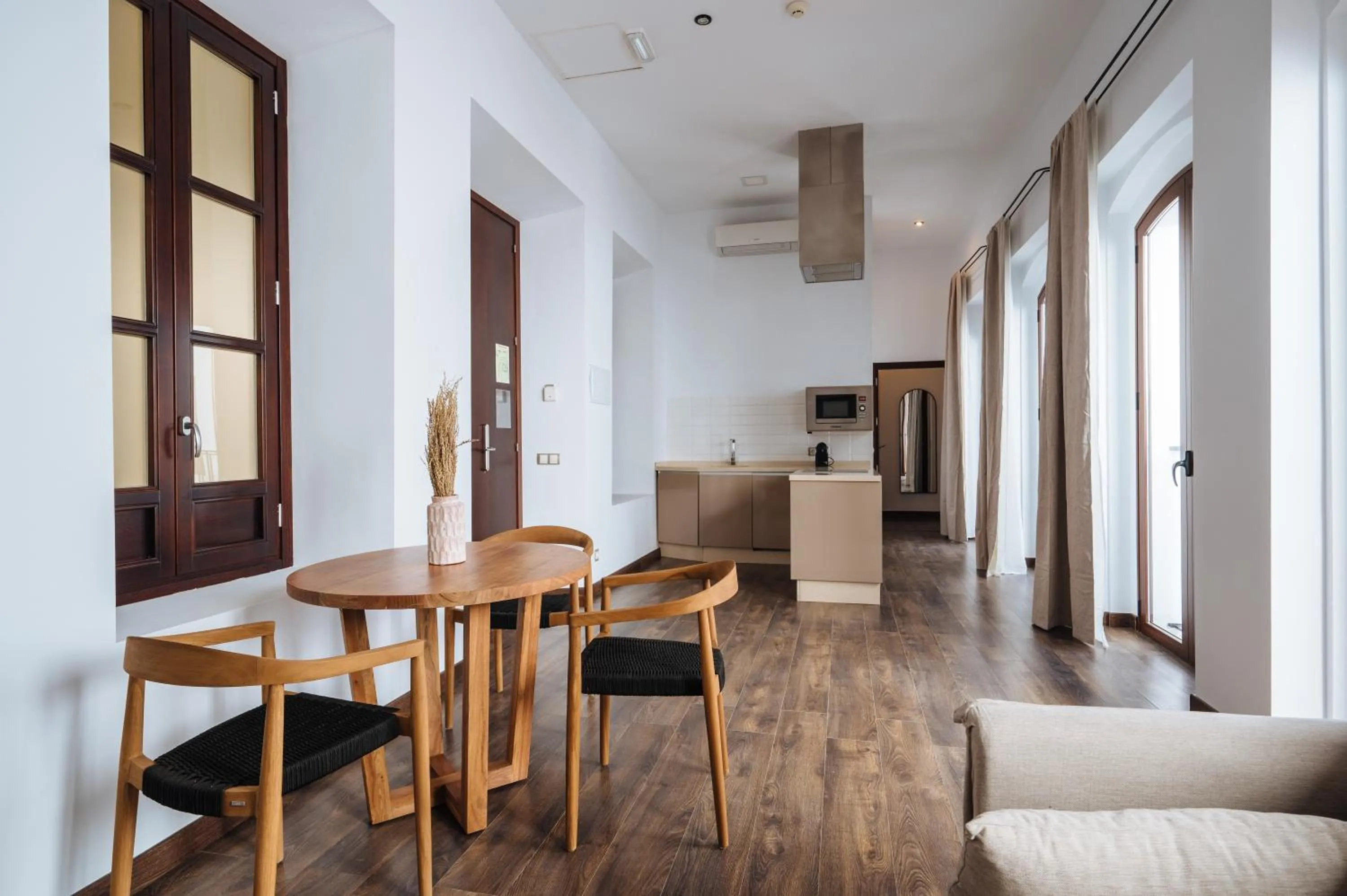 Kitchen or kitchenette in Apartamentos "El Escondite de María"