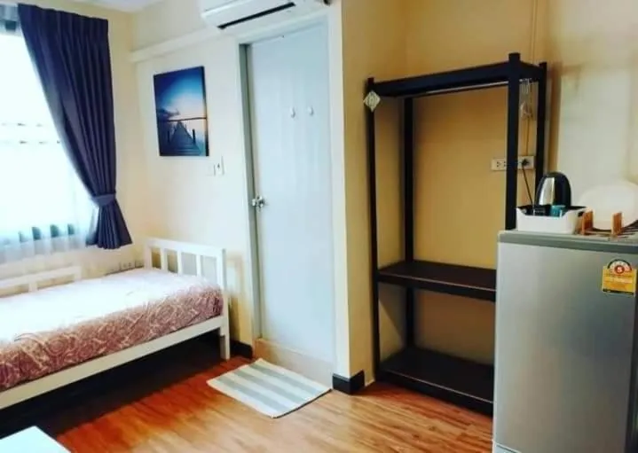 Photo of the whole room, Bed in The Cube Sathorn Boutique Hotel เดอะ คิวบ์ สาทร บูติค โฮเทล Near BTS Surasak