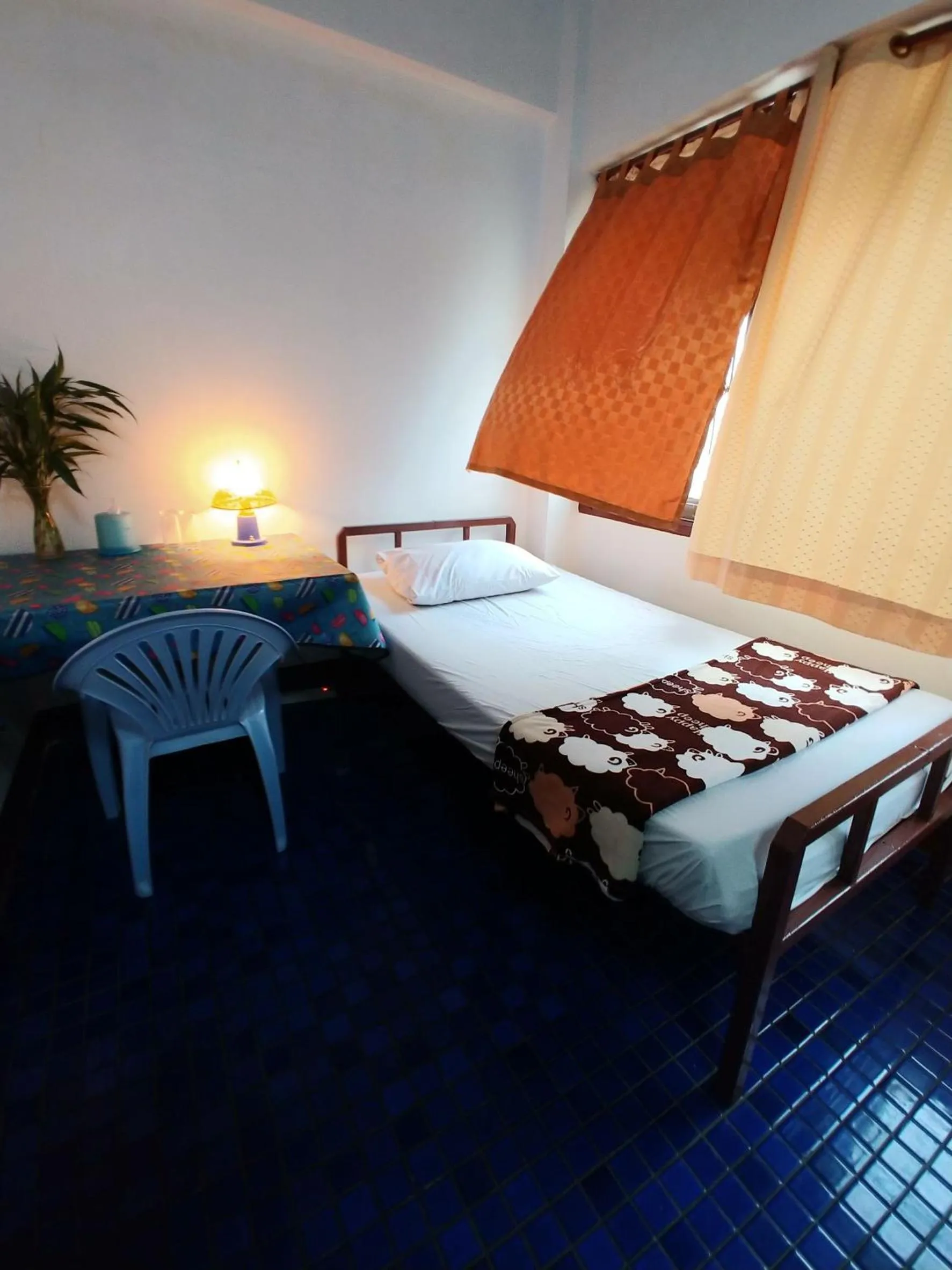 Bed in Prasuri Guest House