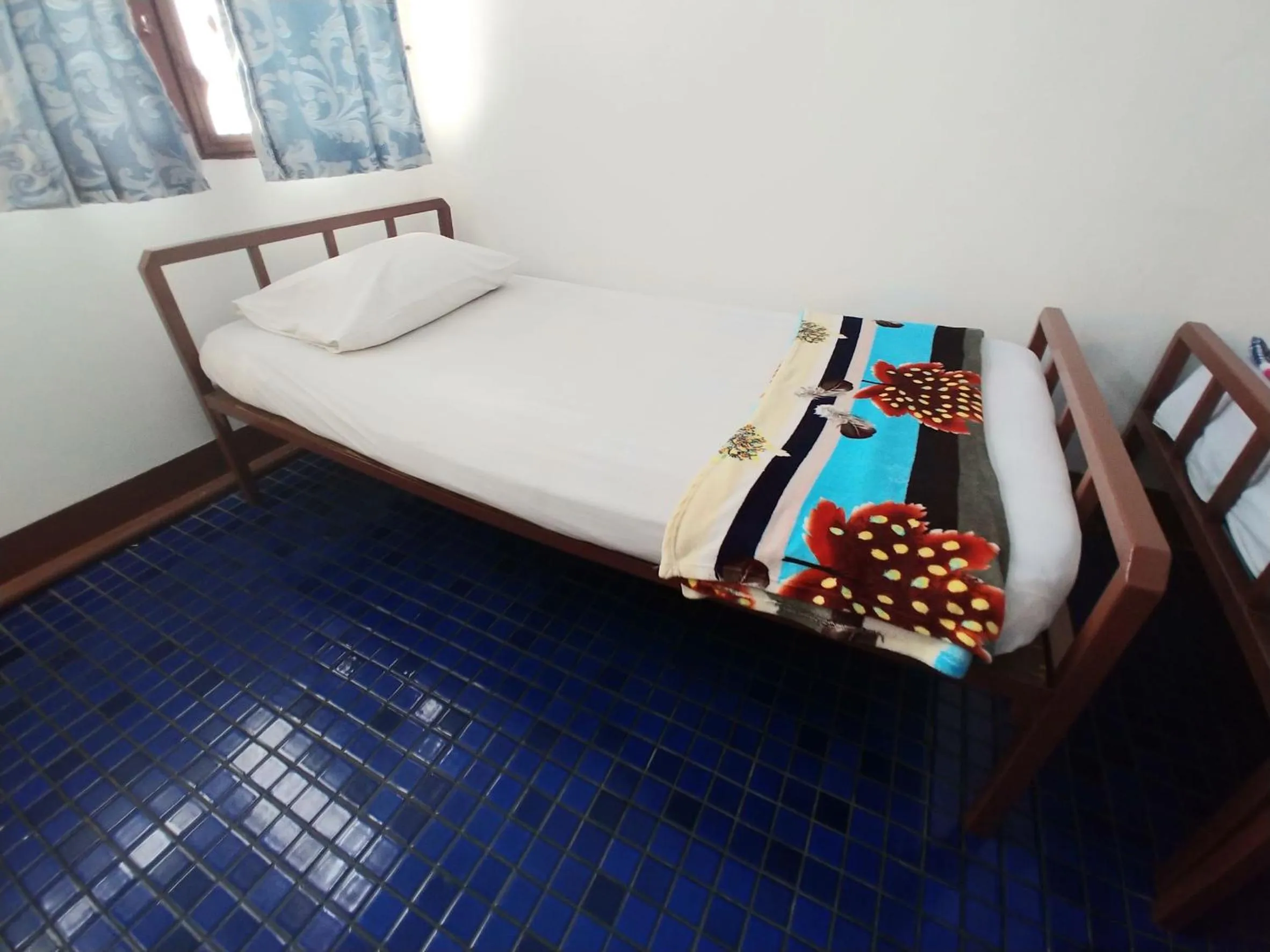 Bed in Prasuri Guest House