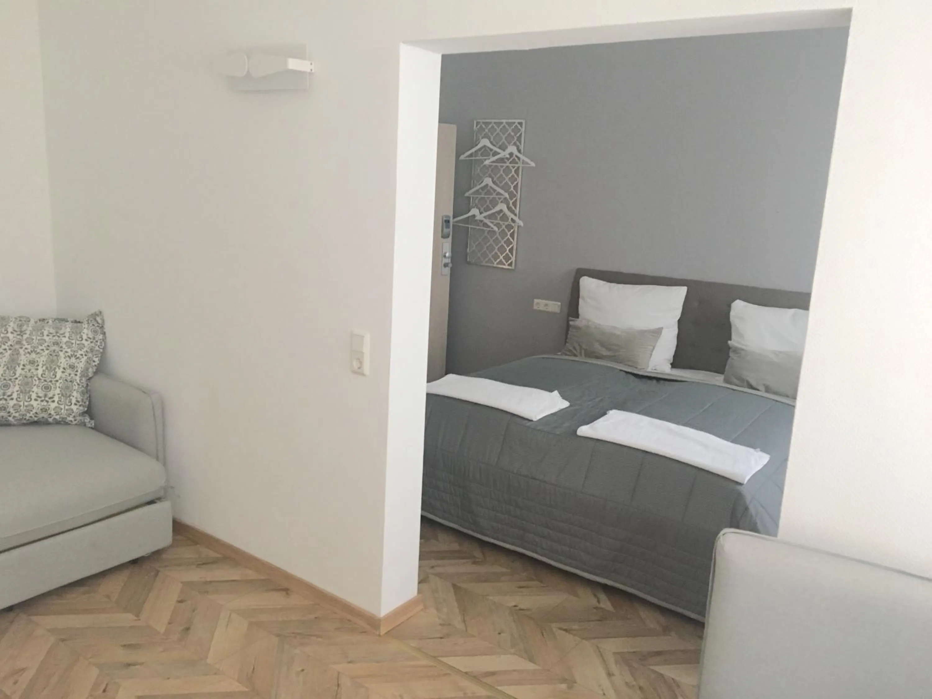 Photo of the whole room, Bed in TM Suites