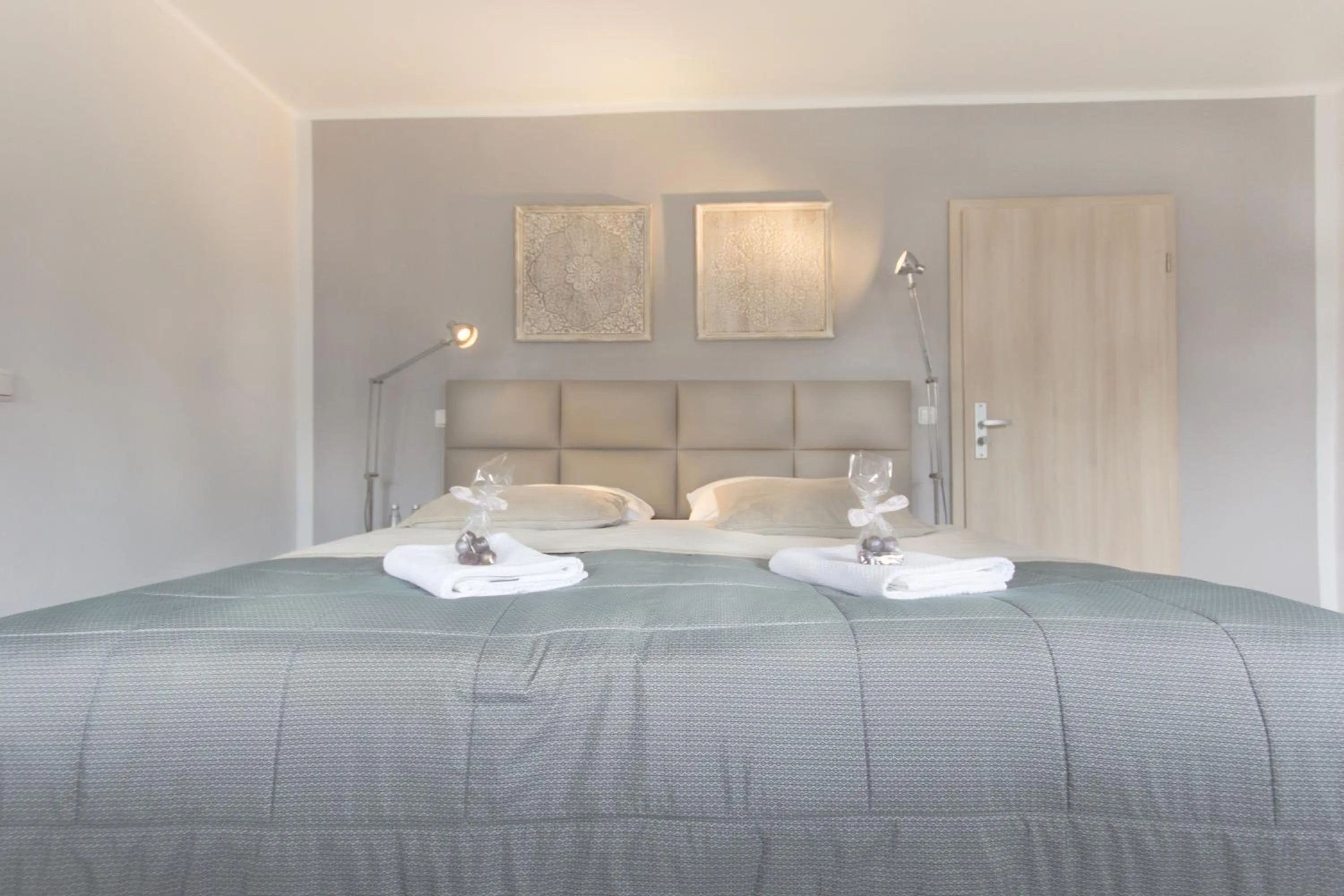 Photo of the whole room, Bed in TM Suites