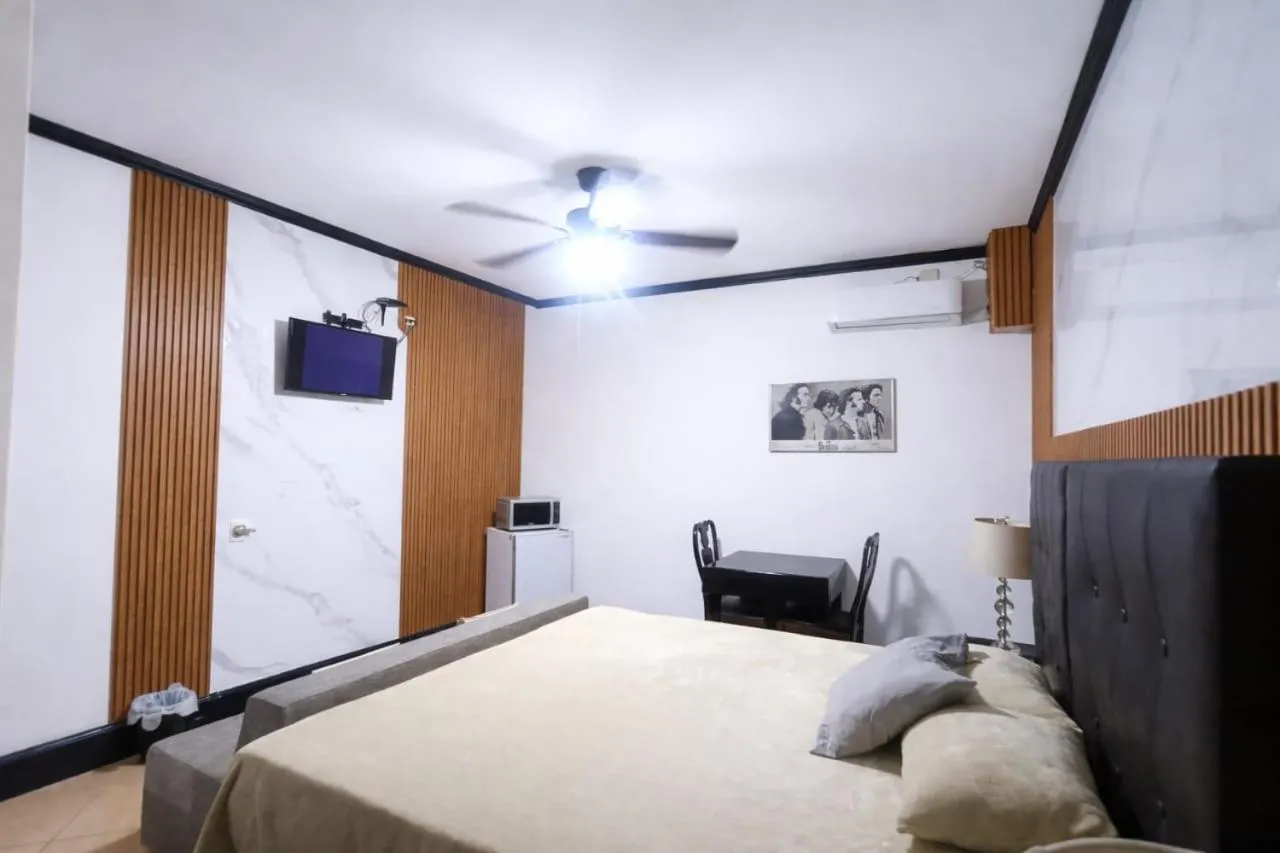 Bed in Hotel Garcias Suites, Linares