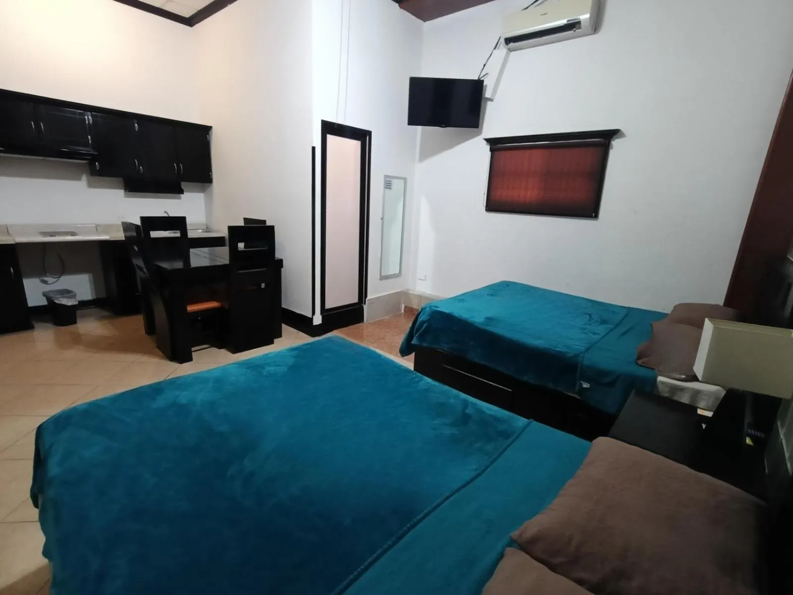 Photo of the whole room, Bed in Hotel Garcias Suites, Linares