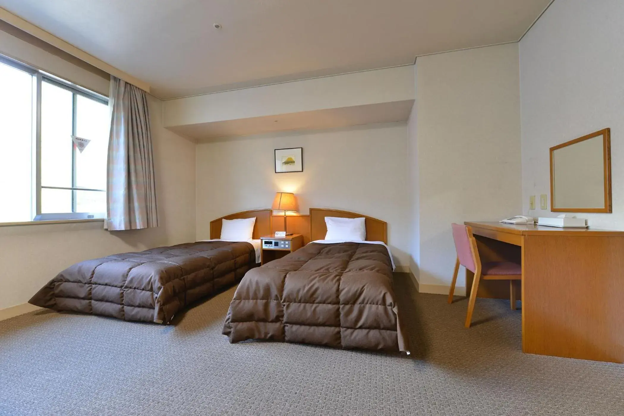 Bed in Ooedo Onsen Monogatari Hotel Kinugawa Gyoen Bed in Ooedo Onsen Monogatari Hotel Kinugawa Gyoen