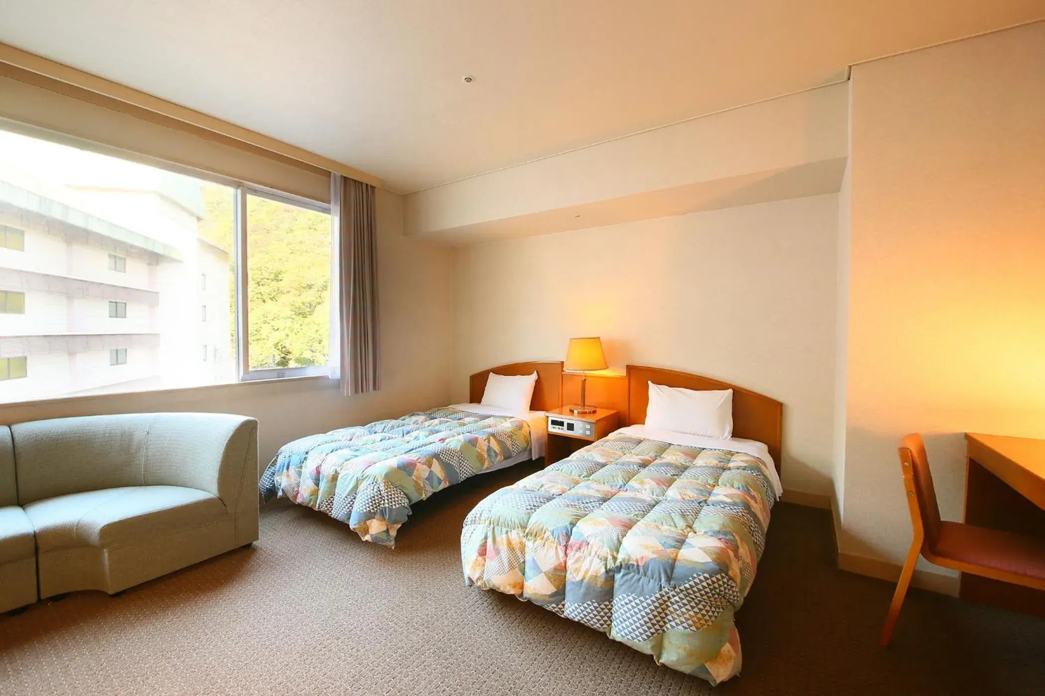 Bed in Ooedo Onsen Monogatari Hotel Kinugawa Gyoen Bed in Ooedo Onsen Monogatari Hotel Kinugawa Gyoen