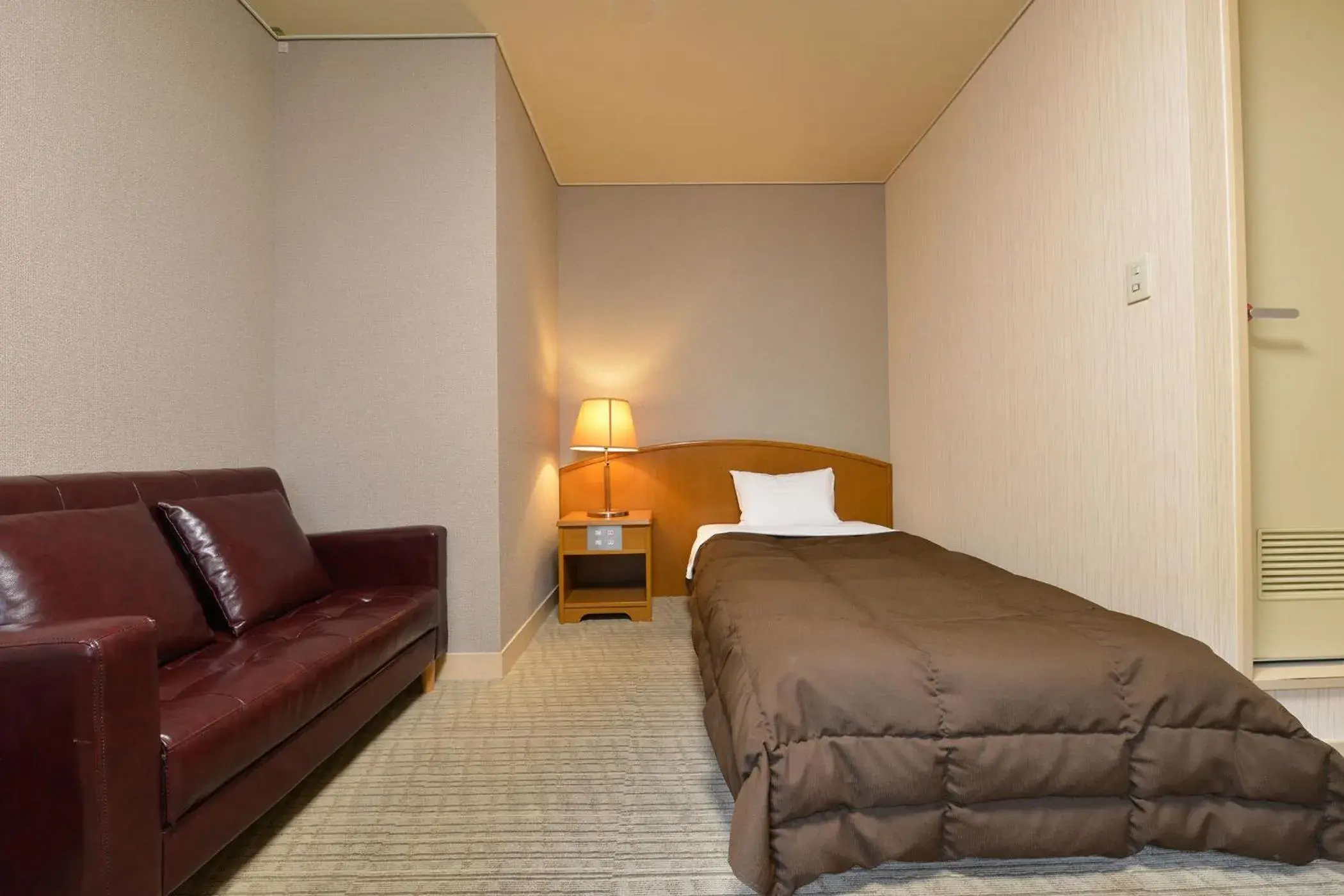 Bed in Ooedo Onsen Monogatari Hotel Kinugawa Gyoen Bed in Ooedo Onsen Monogatari Hotel Kinugawa Gyoen