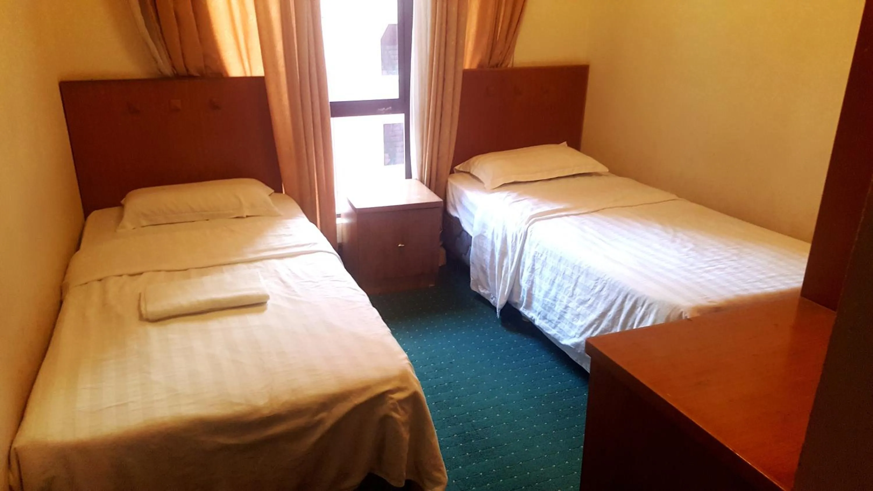 Bedroom, Bed in Homestay Marina Court Resort