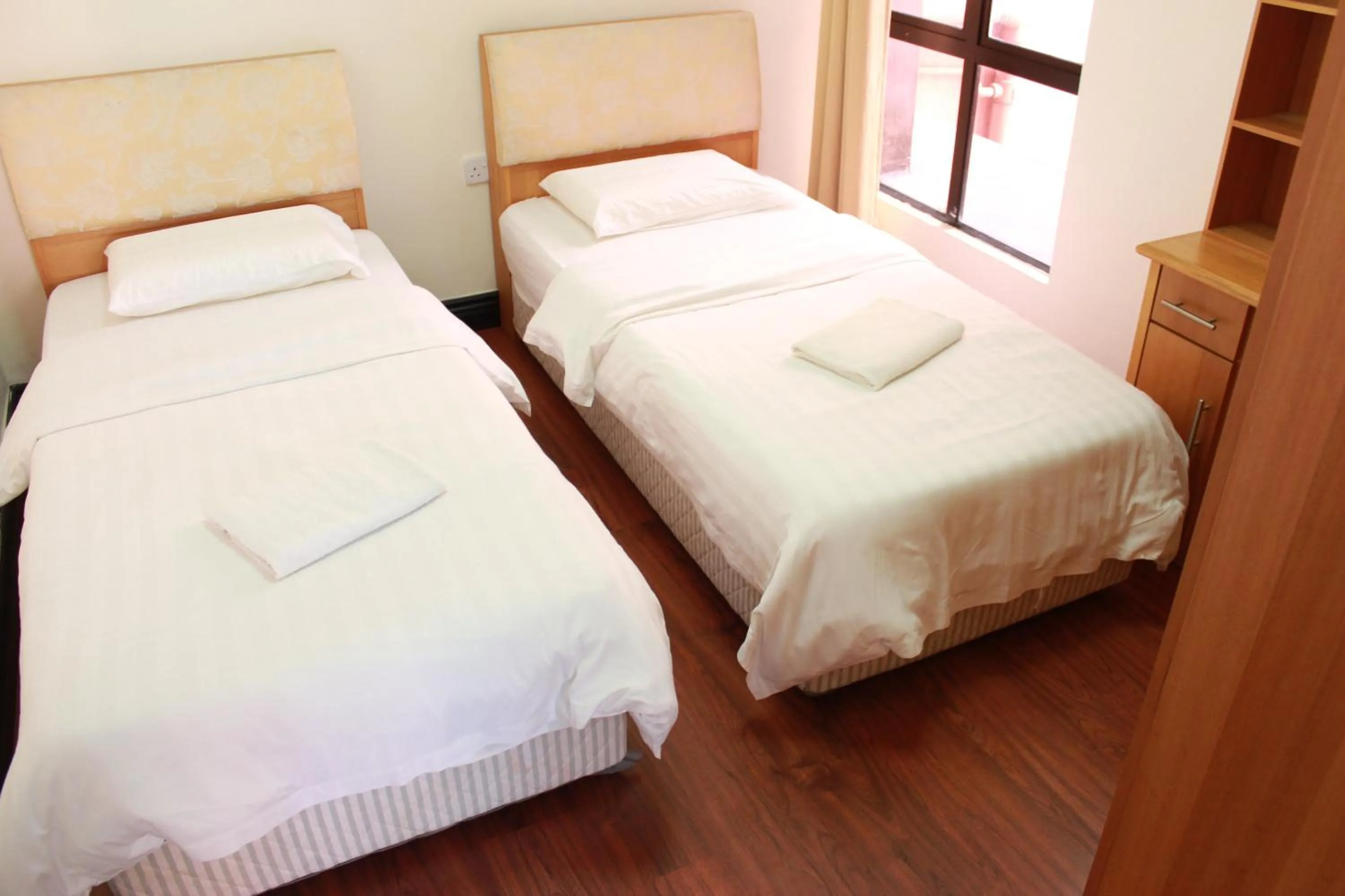 Bedroom, Bed in Homestay Marina Court Resort