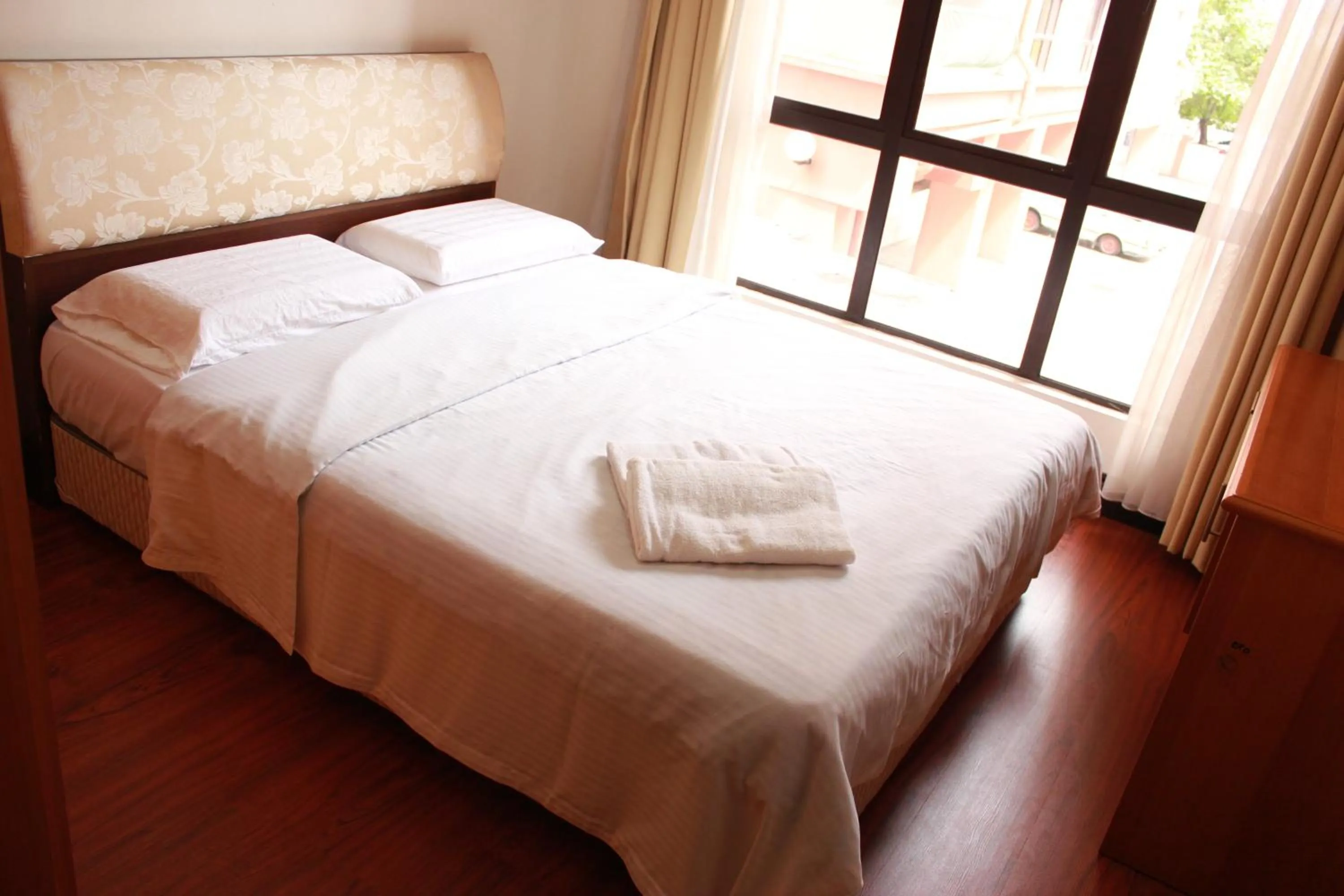 Bedroom, Bed in Homestay Marina Court Resort