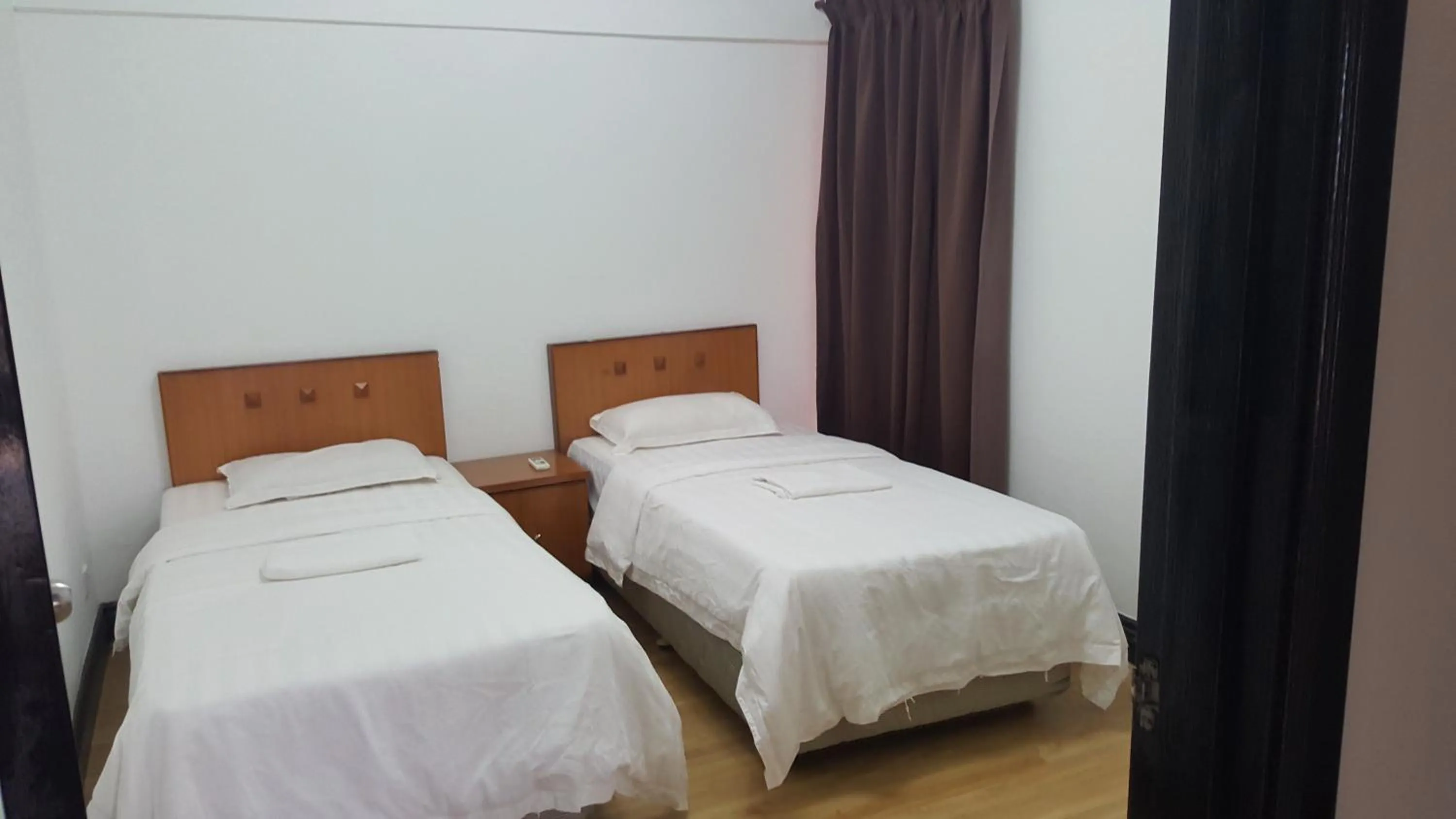 Bed in Homestay Marina Court Resort