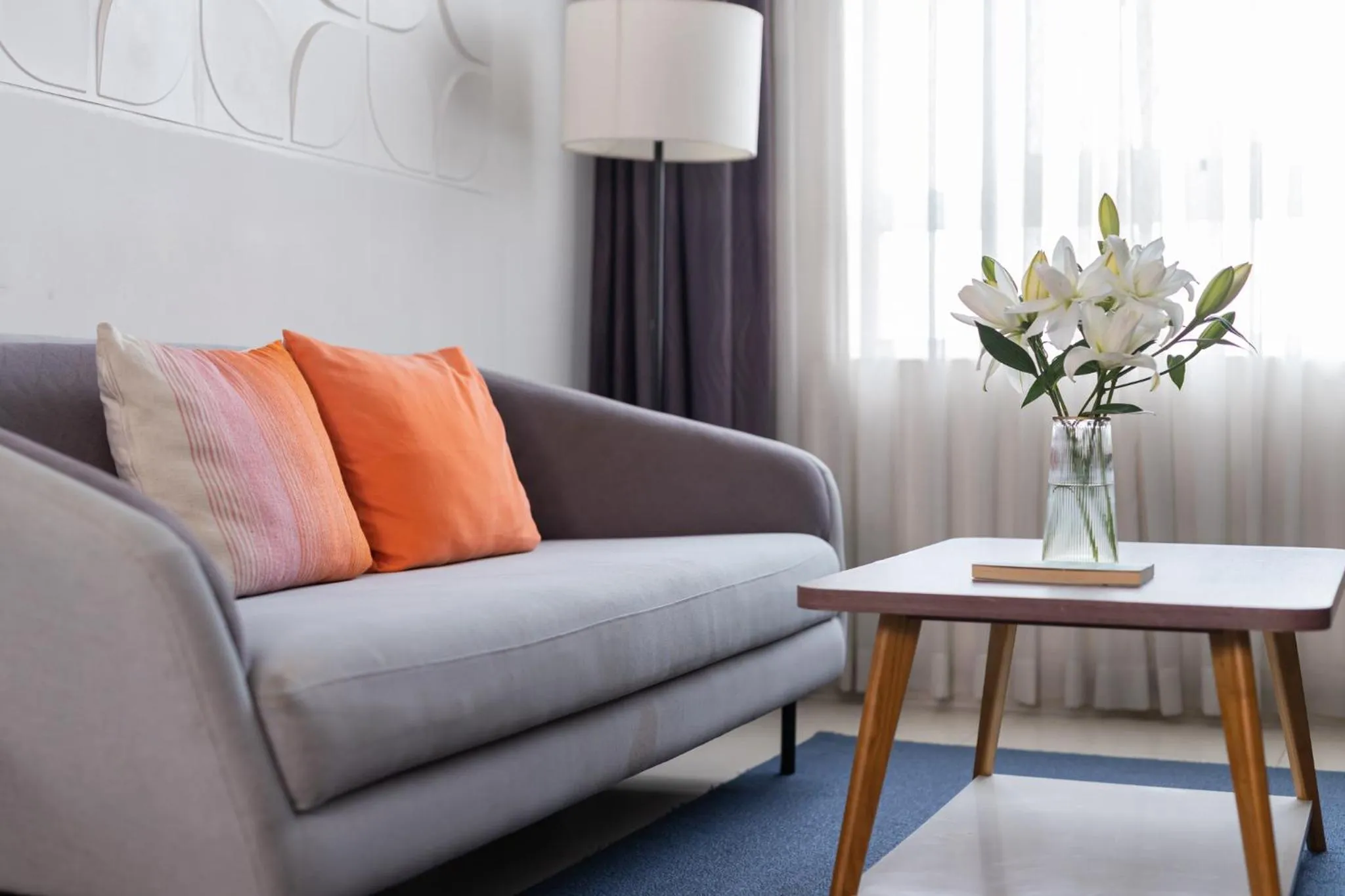 Living room in Đô Thành Residence by DDH