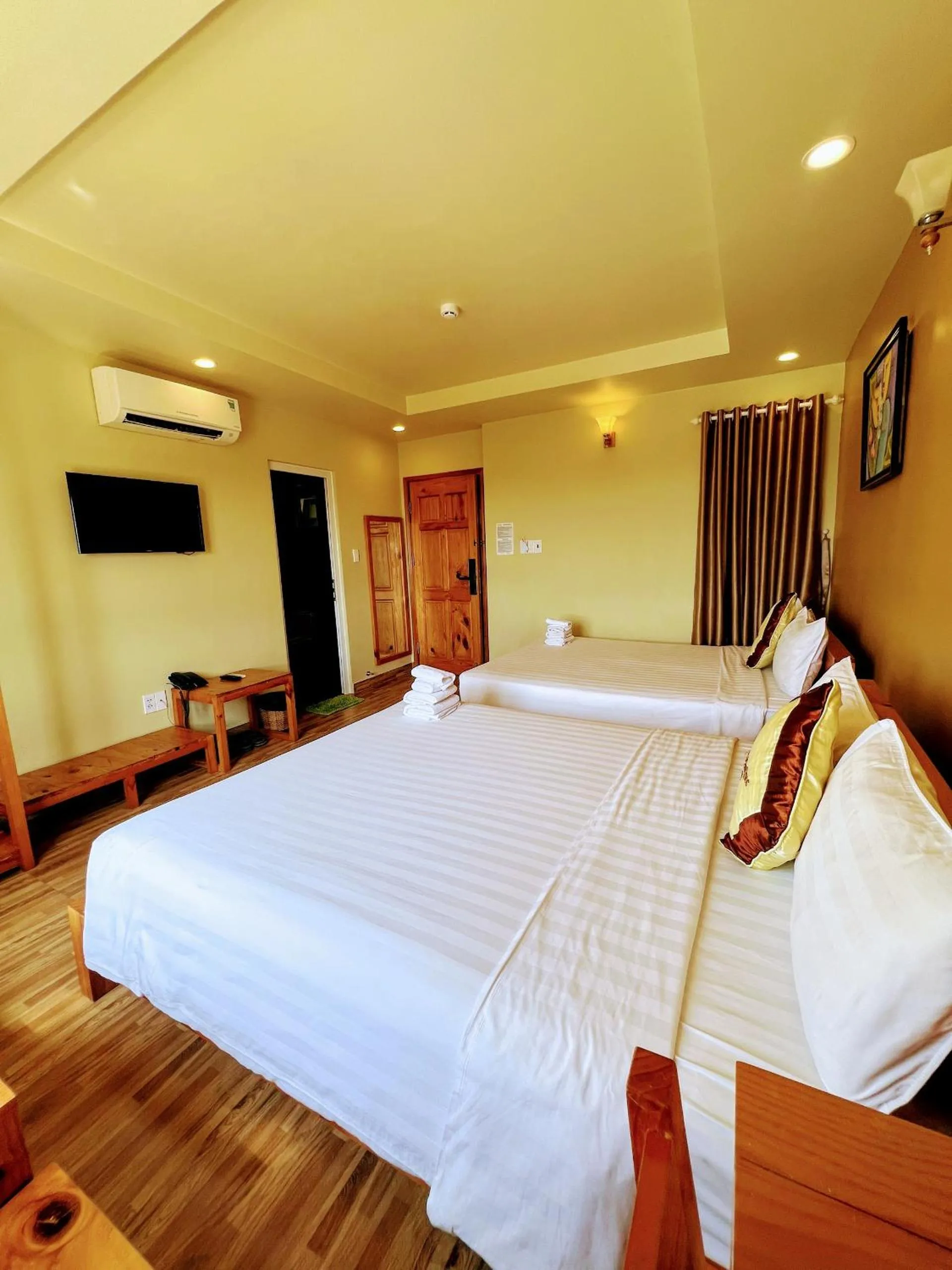 Bed in Lucky Phu Quoc Hotel