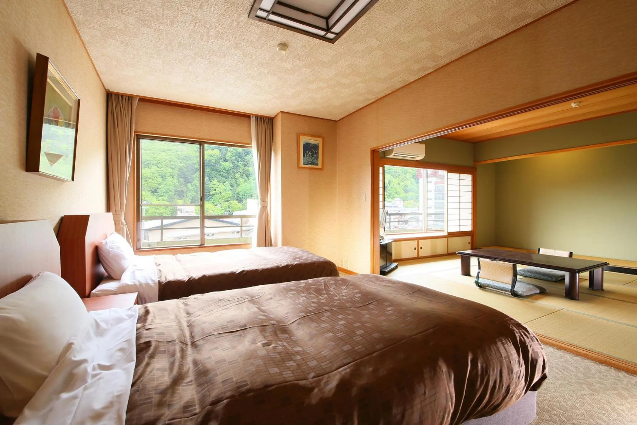 Bed in Ooedo Onsen Monogatari Shinshu Kakeyu