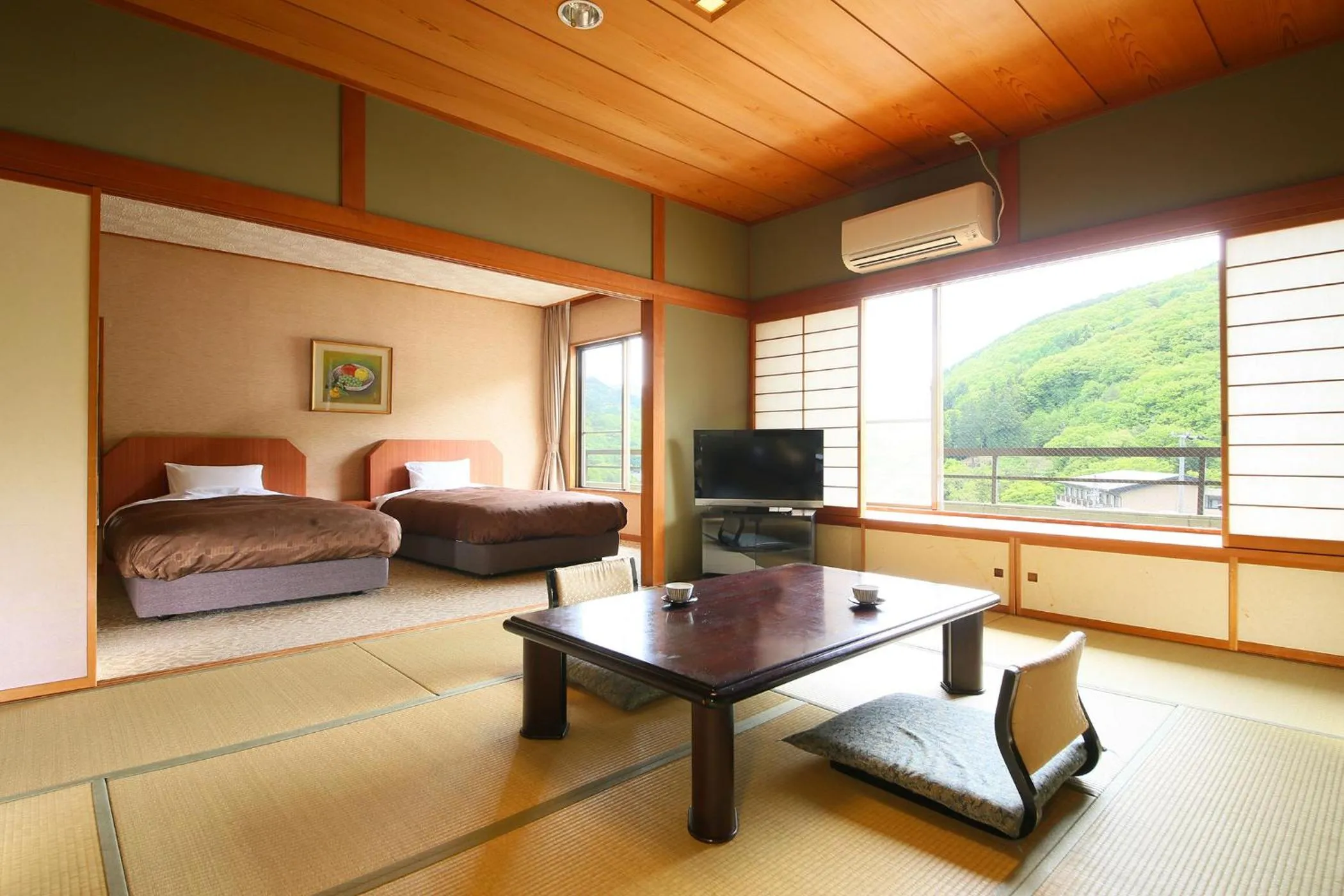 Bed in Ooedo Onsen Monogatari Shinshu Kakeyu