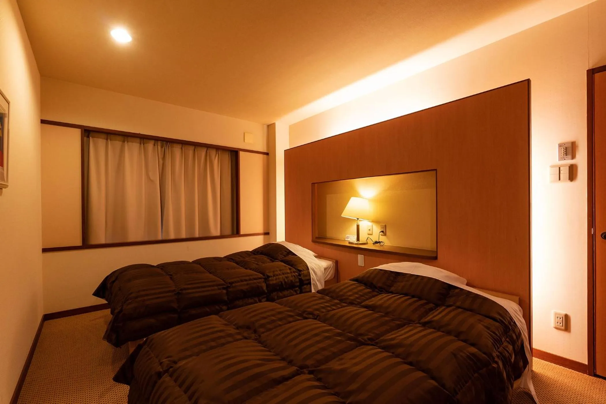 Photo of the whole room, Bed in Ooedo Onsen Monogatari Higashiyama Grand Hotel