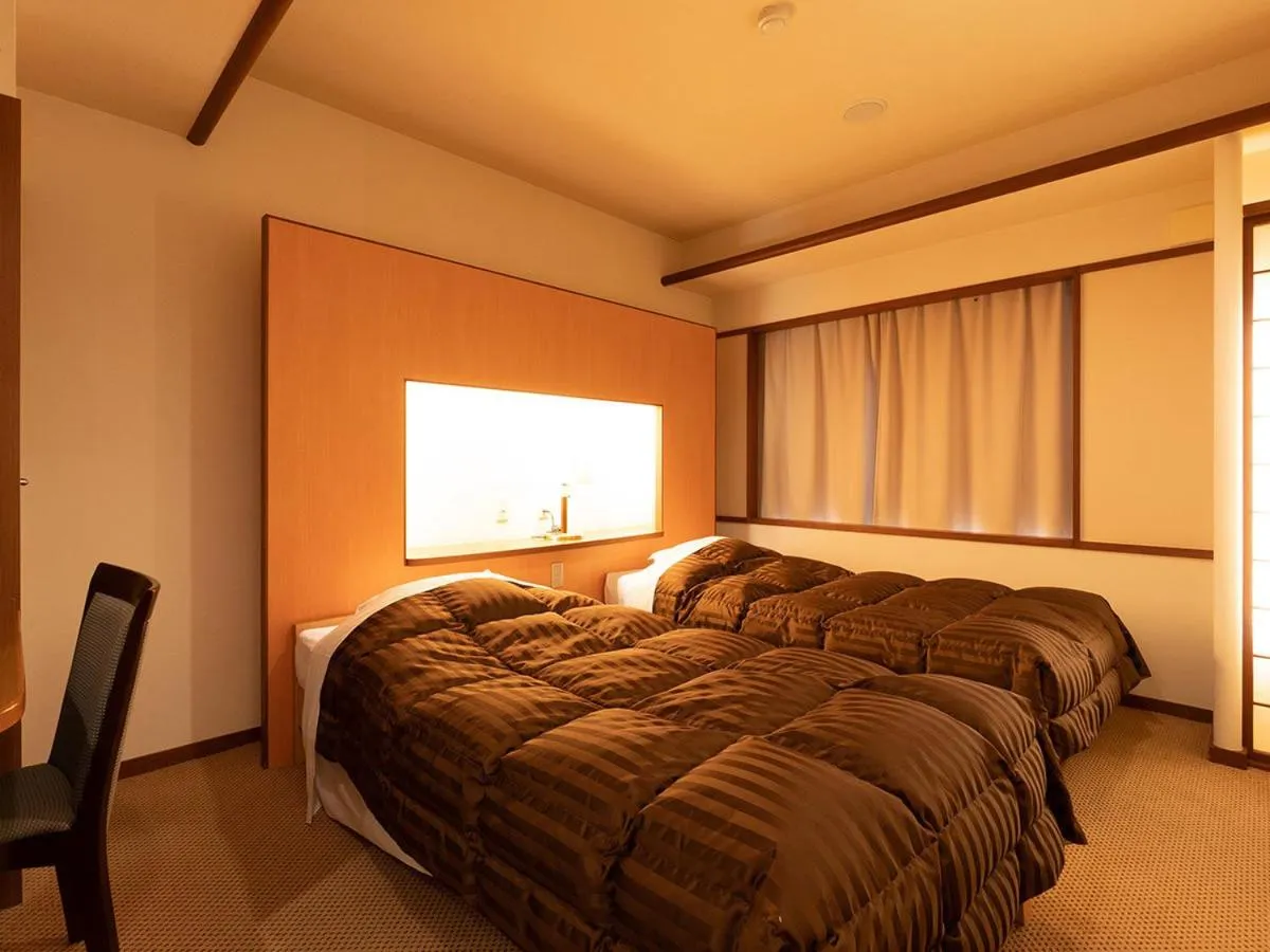 Photo of the whole room, Bed in Ooedo Onsen Monogatari Higashiyama Grand Hotel