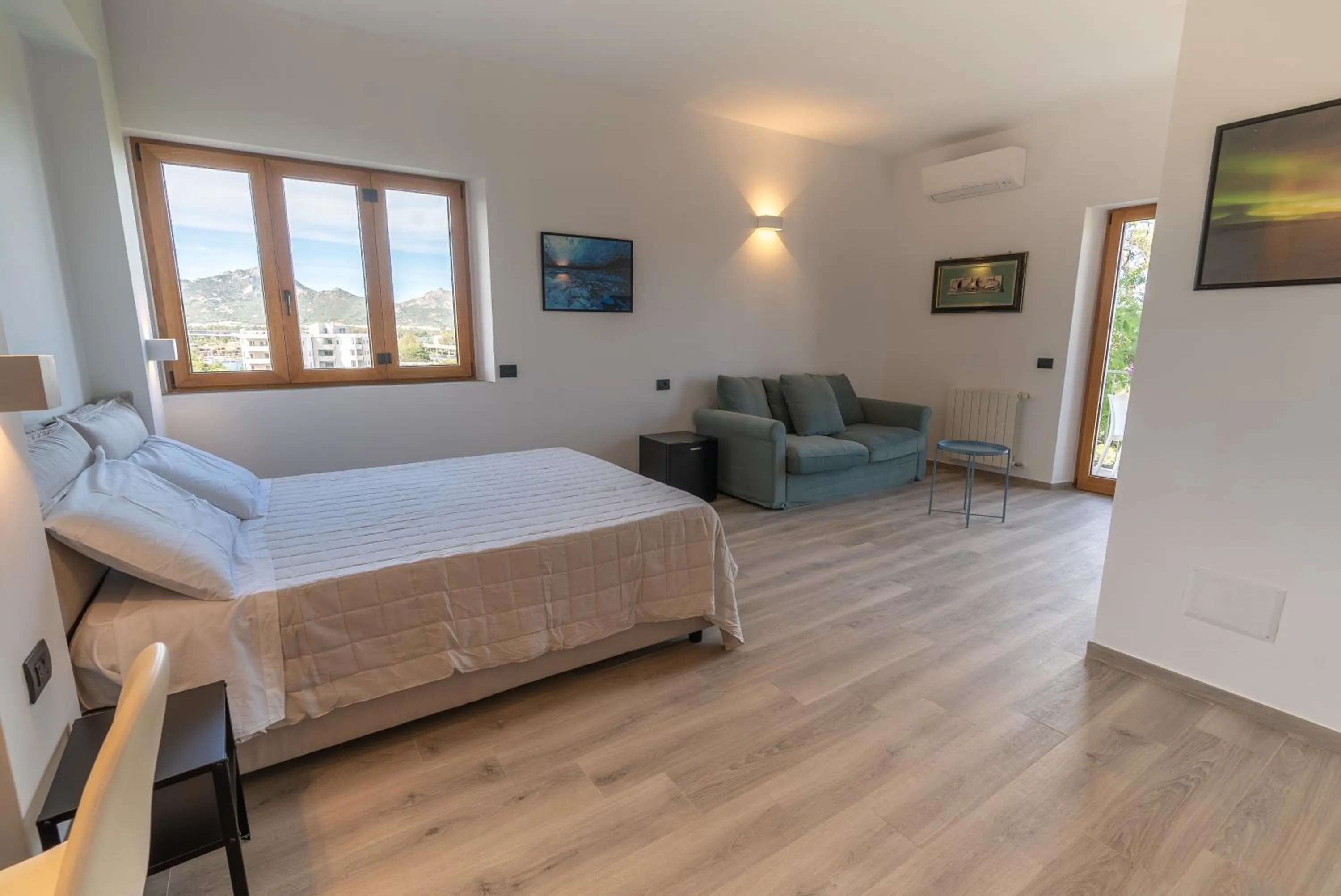 Photo of the whole room, Bed in Antares Rooms and Suites