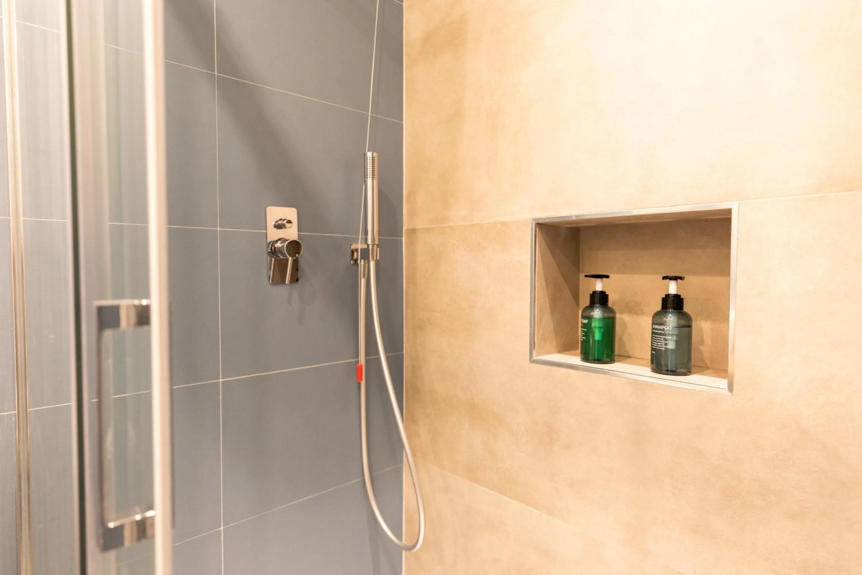 Bathroom in Antares Rooms and Suites