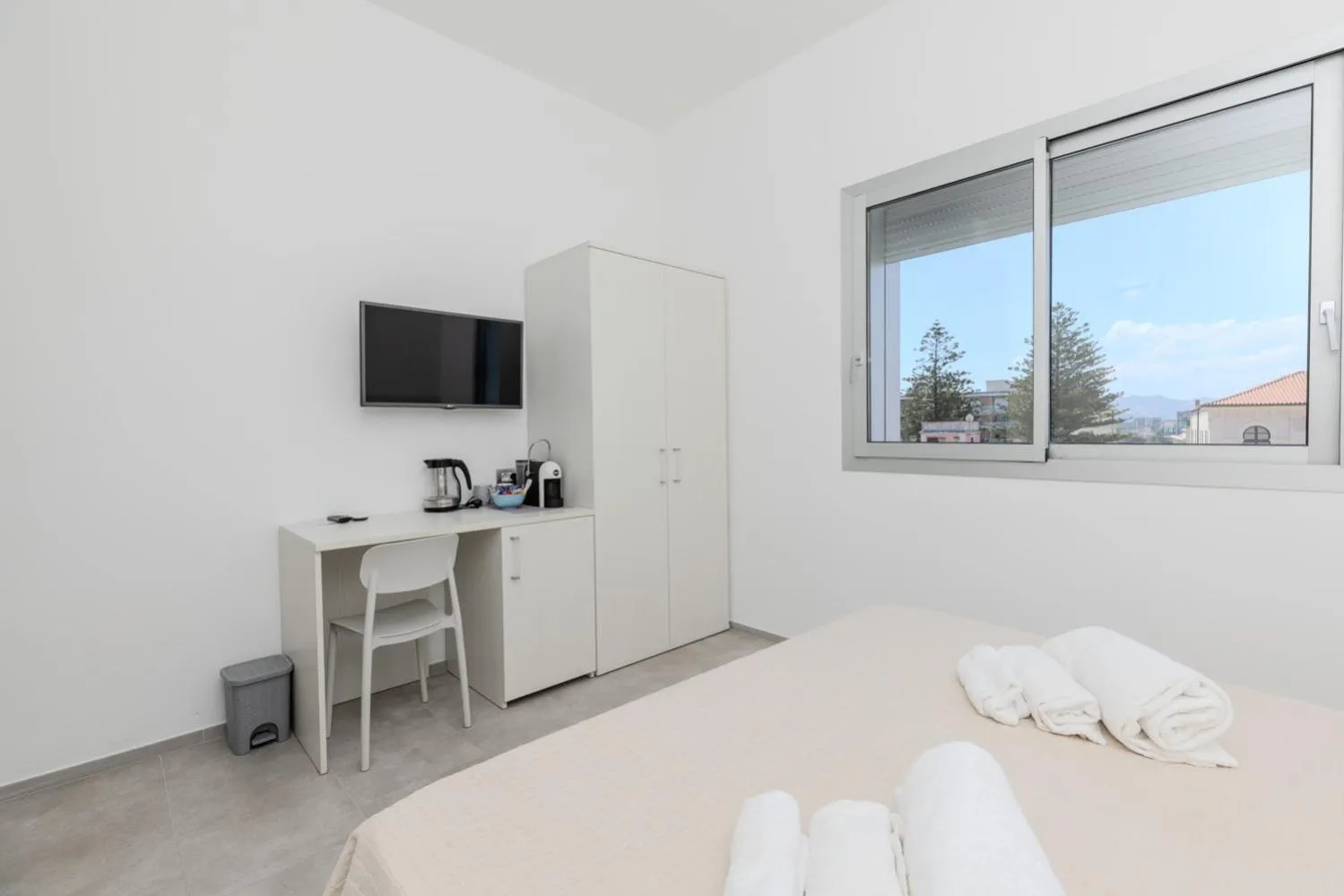 Bed in Antares Rooms and Suites