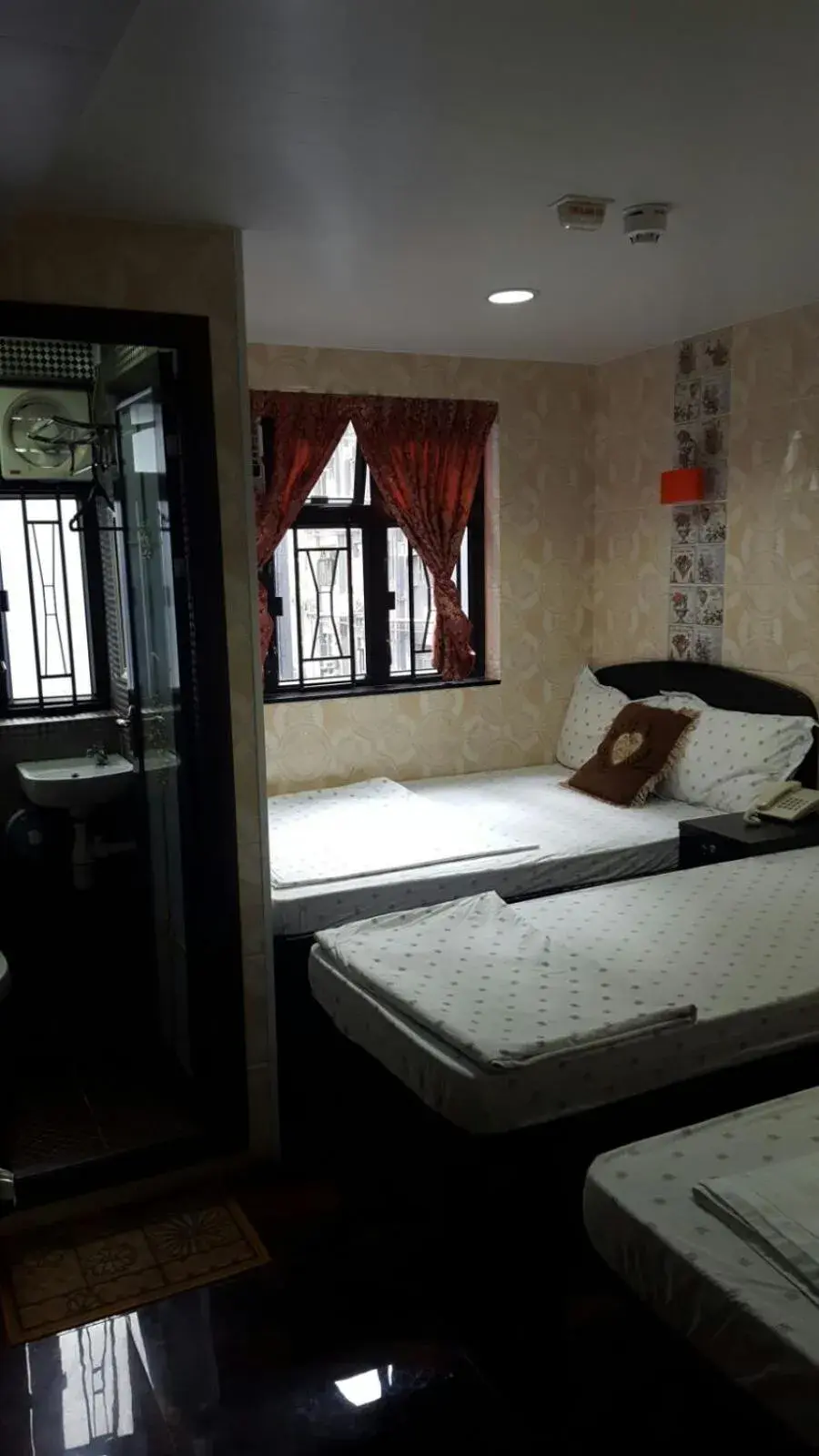 Triple Room with 3 Single Beds in Dutch Hostel Triple Room with 3 Single Beds in Dutch Hostel