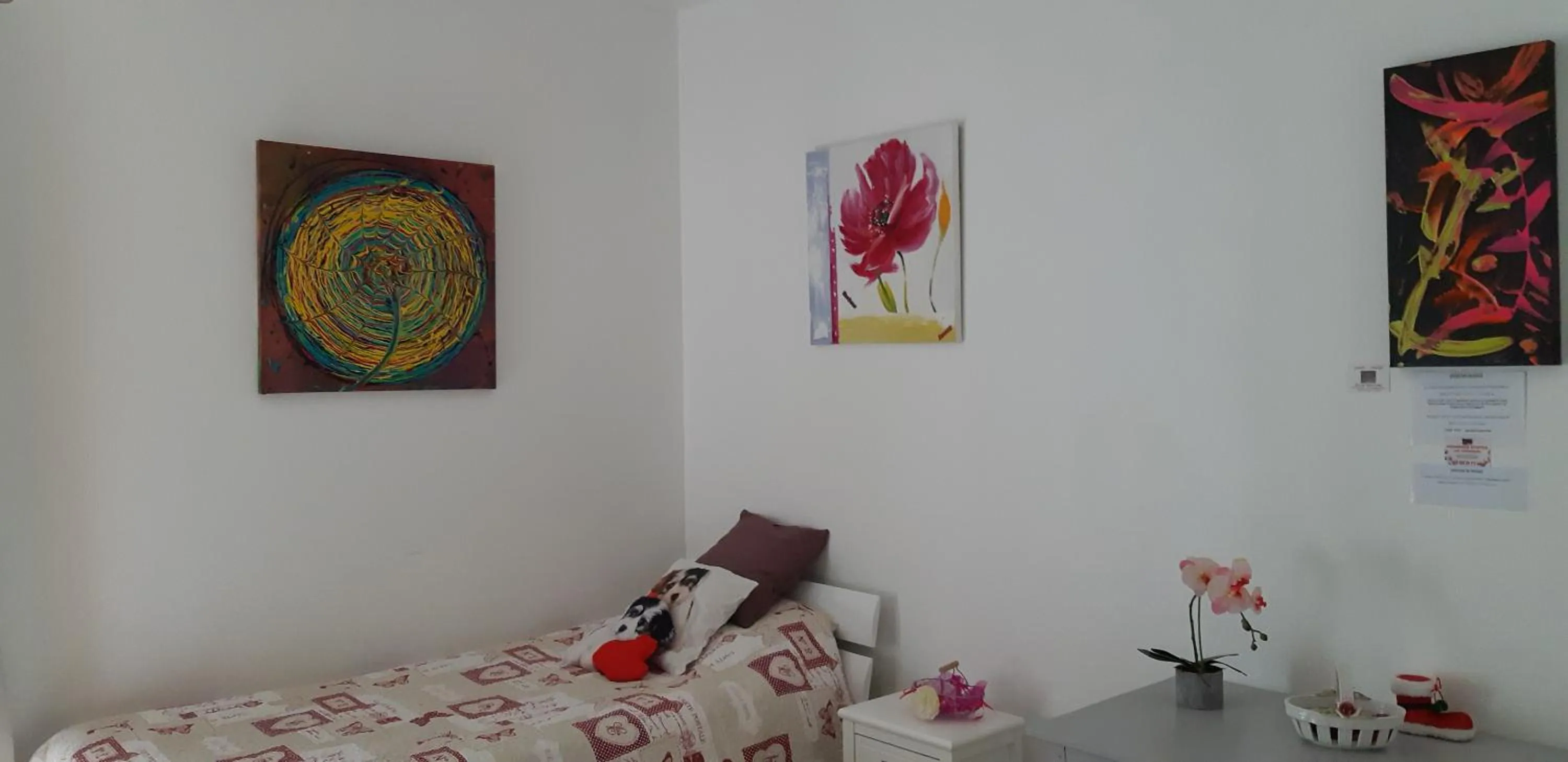 Bed in Chambre d'Hôtes Les Orchidées FUTUROSCOPE CHASSENEUIL POITIERS