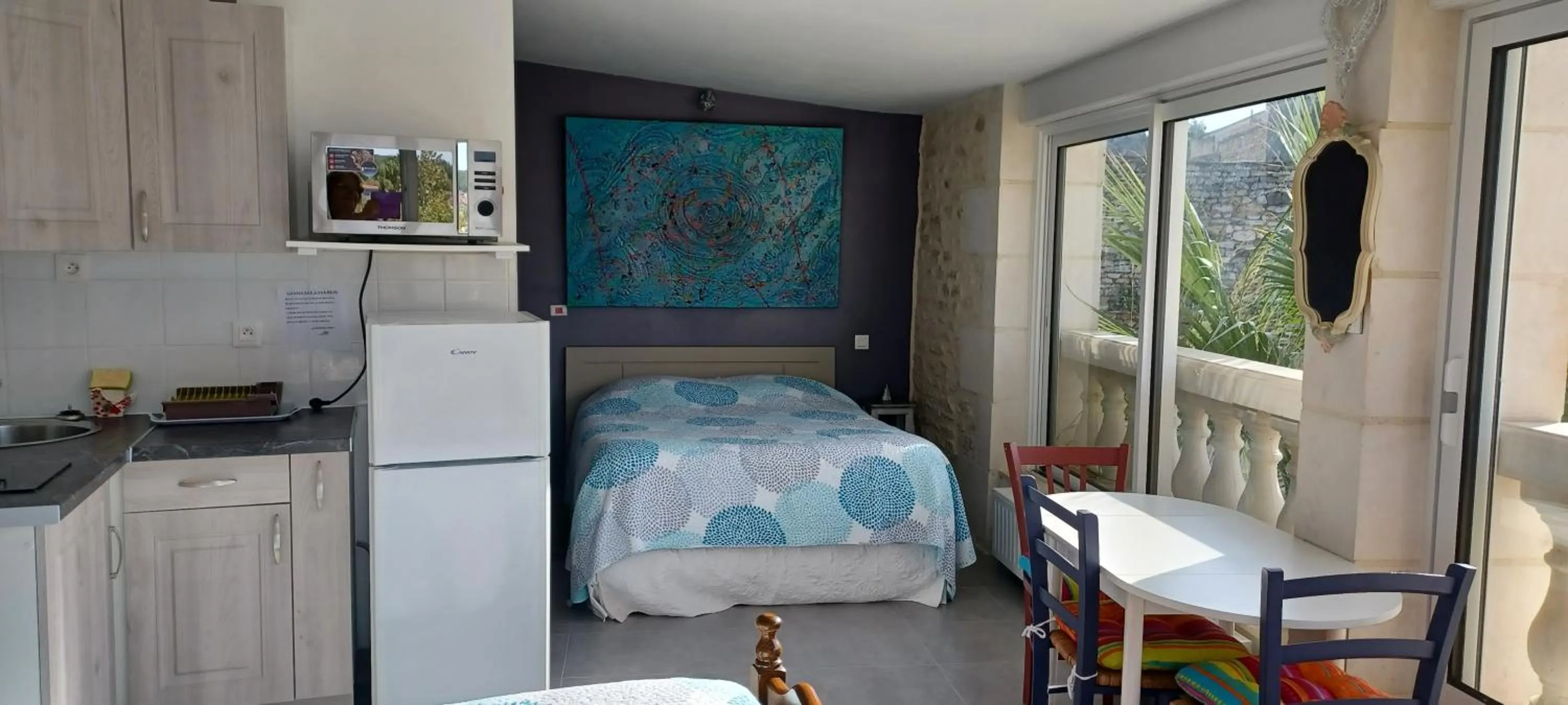 Bed in Chambre d'Hôtes Les Orchidées FUTUROSCOPE CHASSENEUIL POITIERS