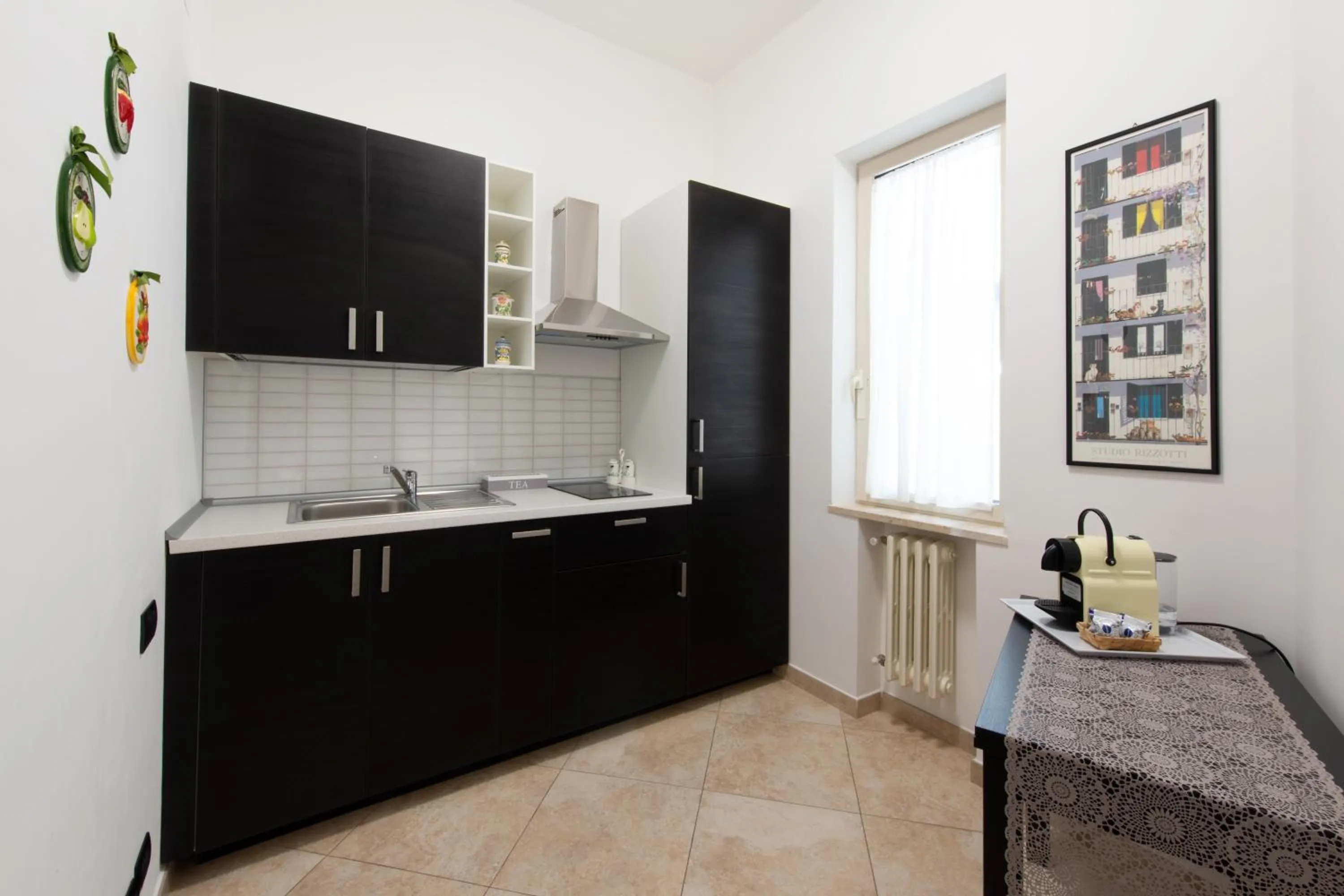 Kitchen or kitchenette in L'Insolita Reggia