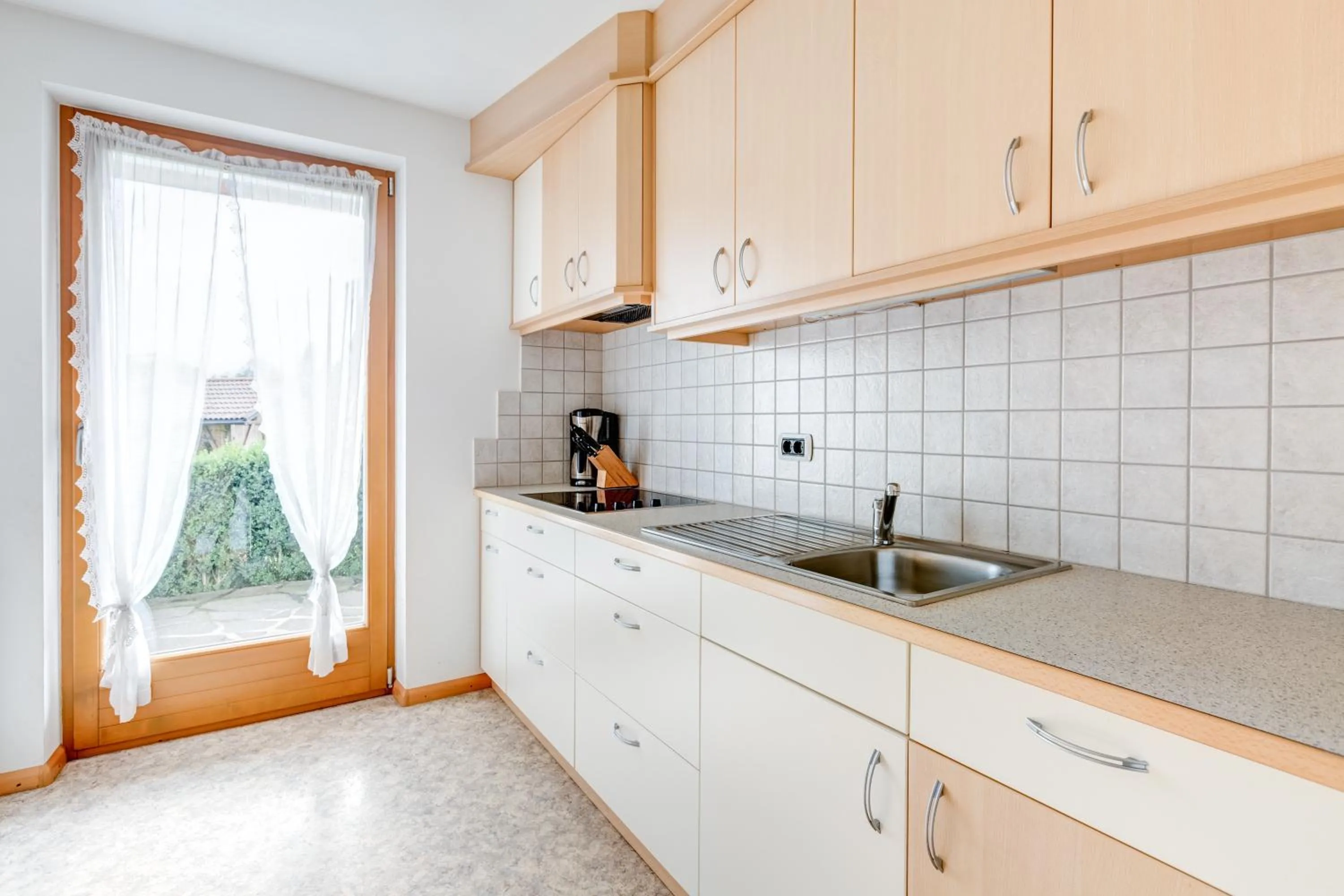 Kitchen or kitchenette in Pension Haus am See