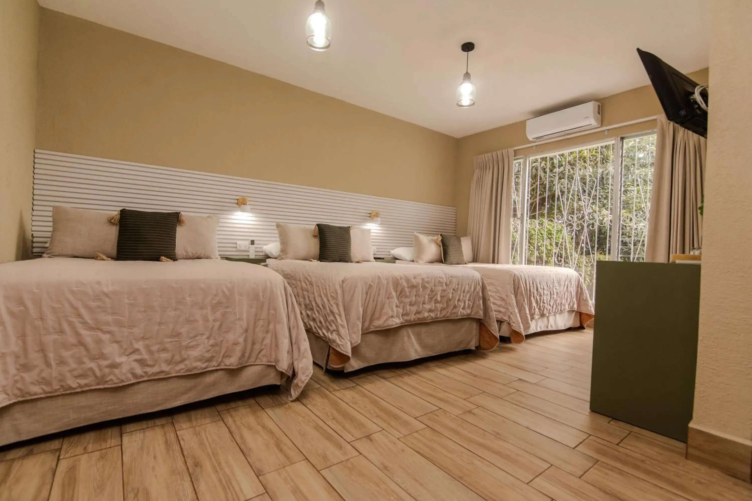 Bed in In & Out Hotel Bed in In & Out Hotel