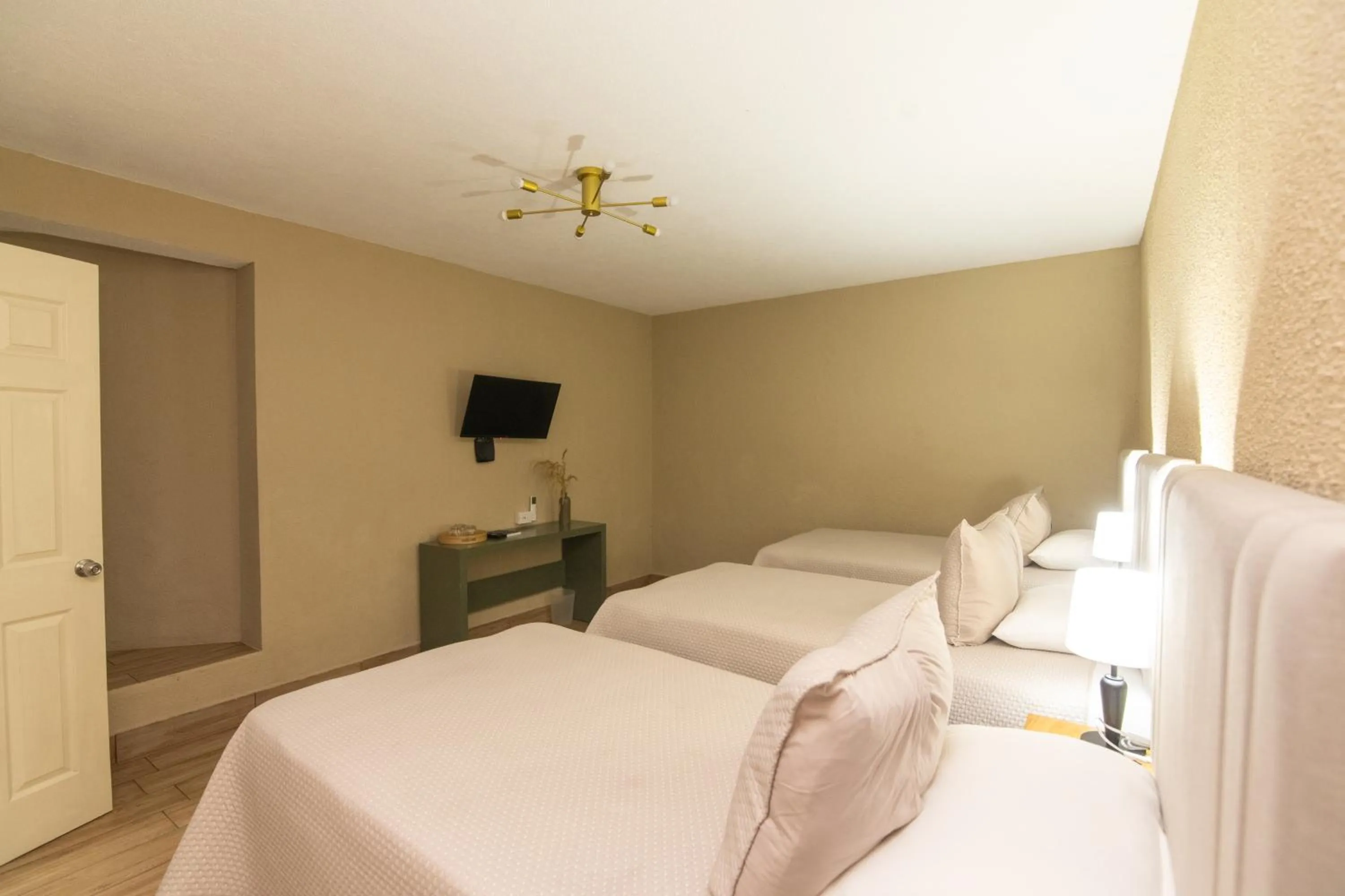 Bed in In & Out Hotel