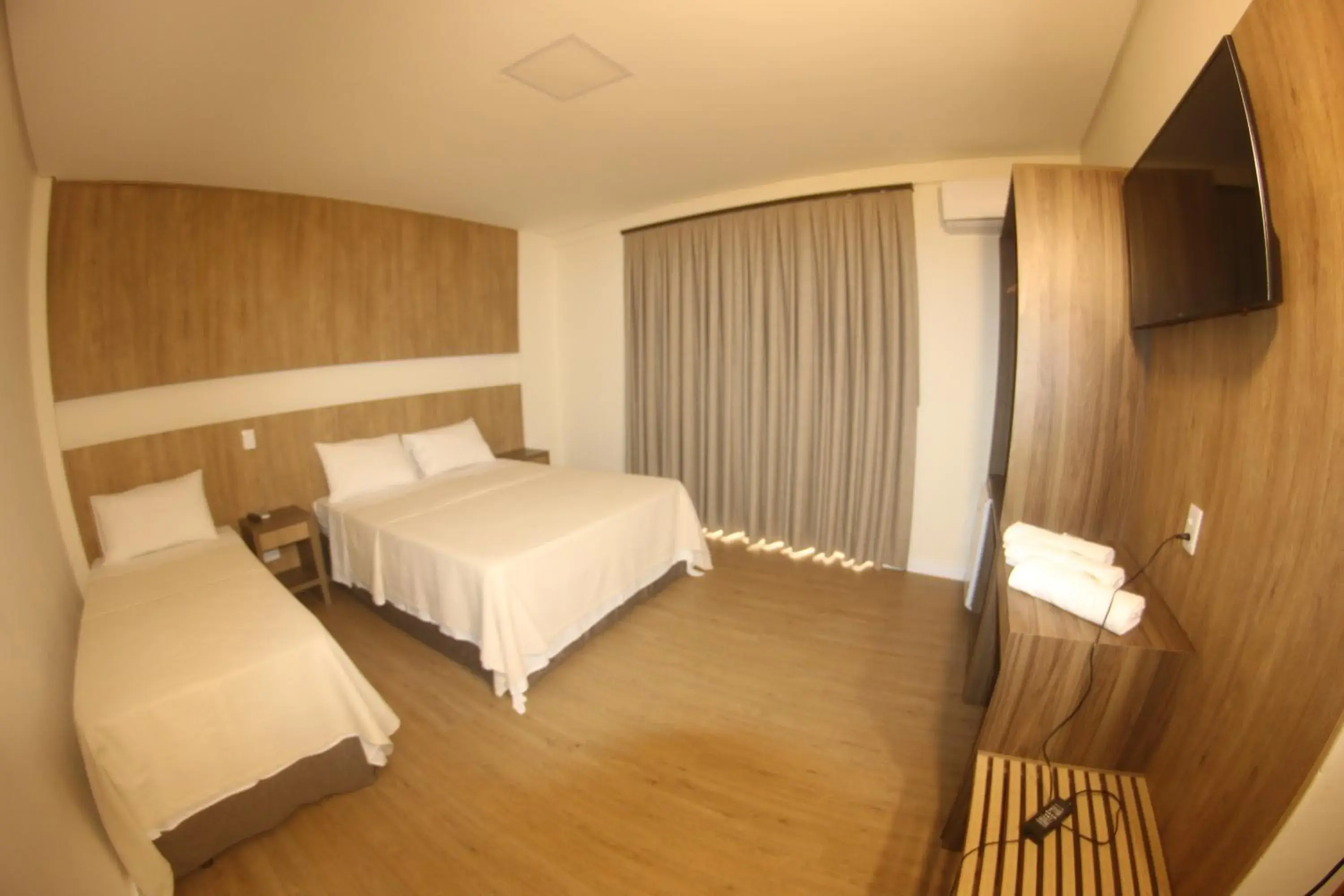 Luxury Triple Room in Ouro Minas Plaza Hotel Luxury Triple Room in Ouro Minas Plaza Hotel
