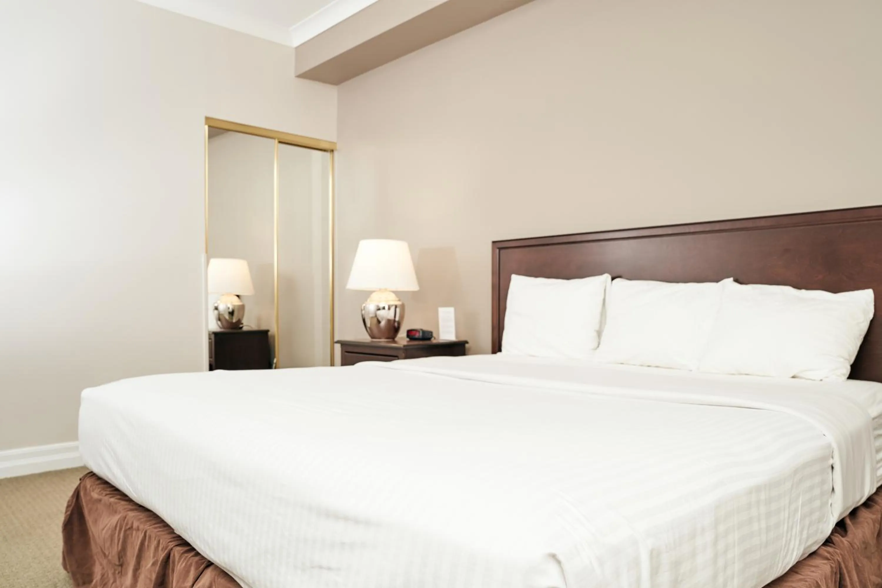 Bed in RiverRock Inn