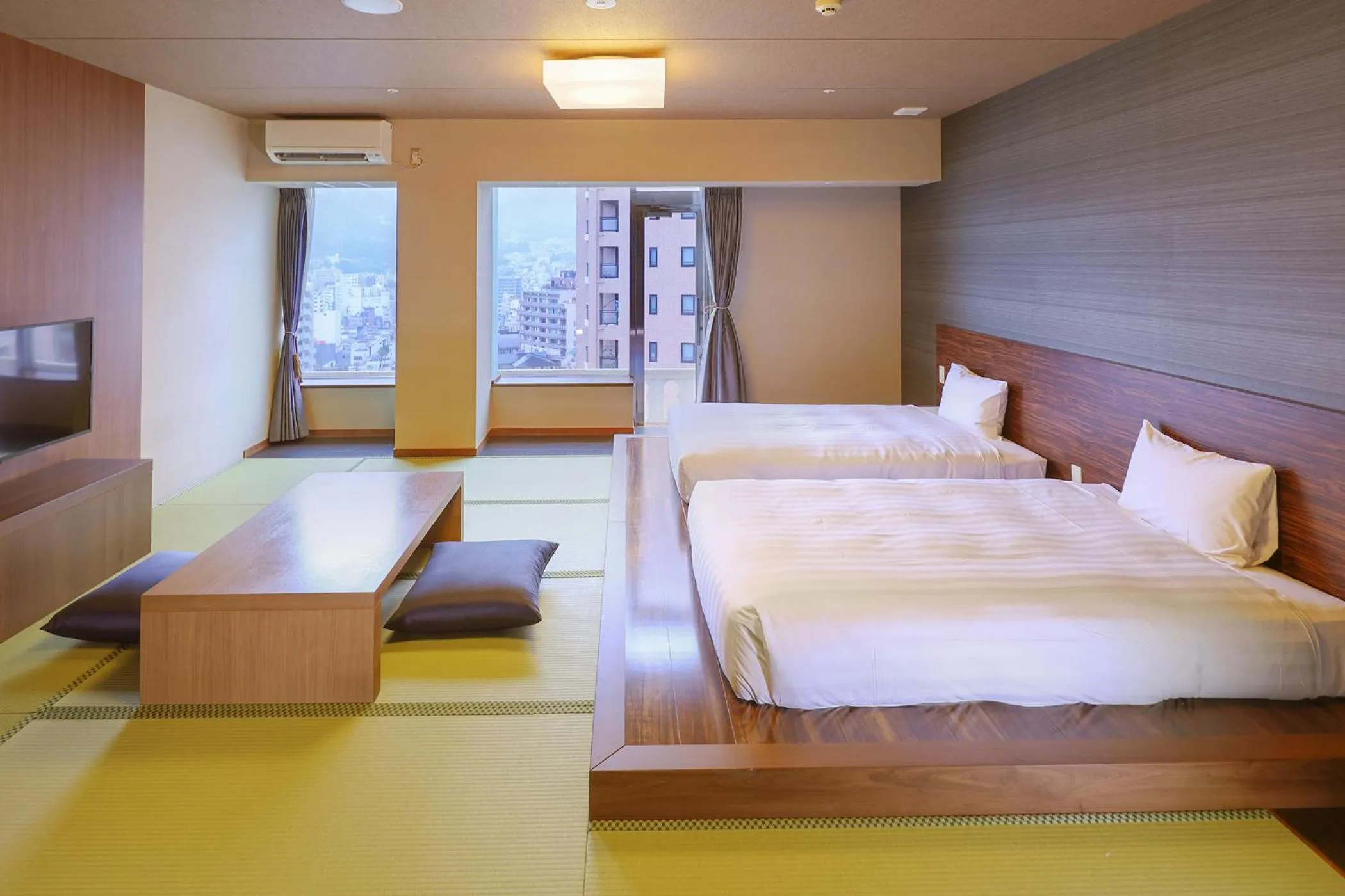 Bed in Ooedo Onsen Monogatari Premium Atami