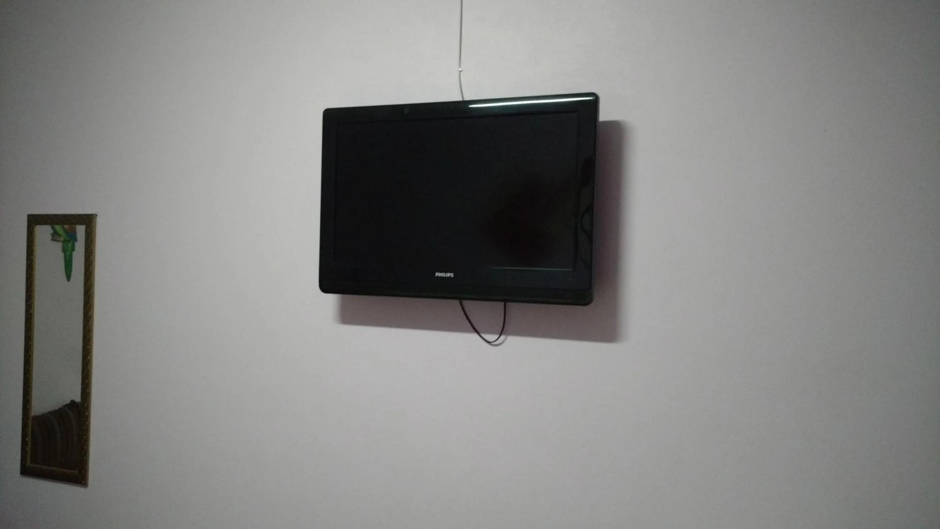 TV and multimedia in Suites Canto dos Passaros