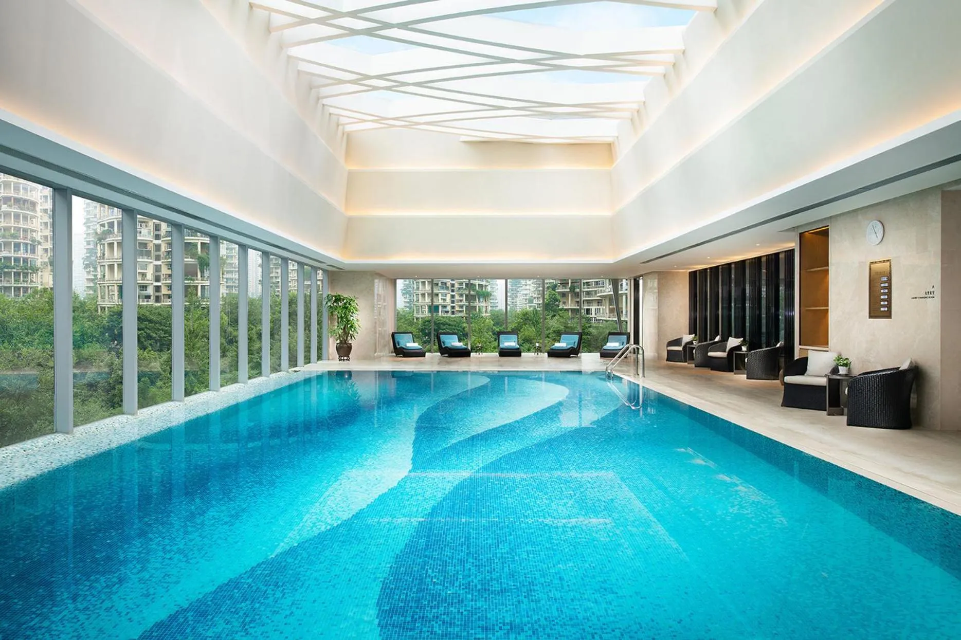 Swimming pool in Vignette Collection Palm Springs Hotel Chengdu by IHG