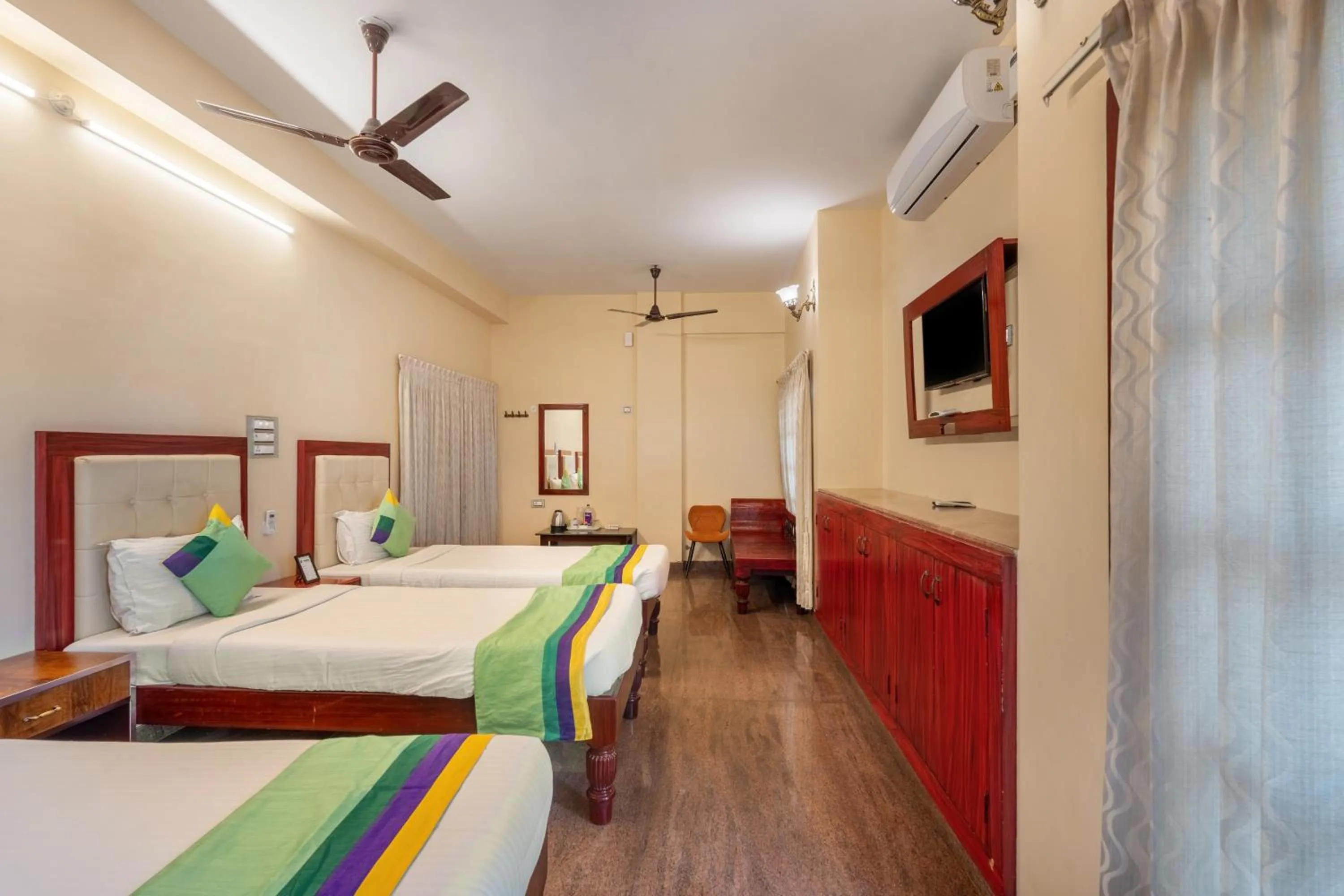 Bedroom, Bed in Treebo Grace Inn, 3 Min Walk From Promenade Beach