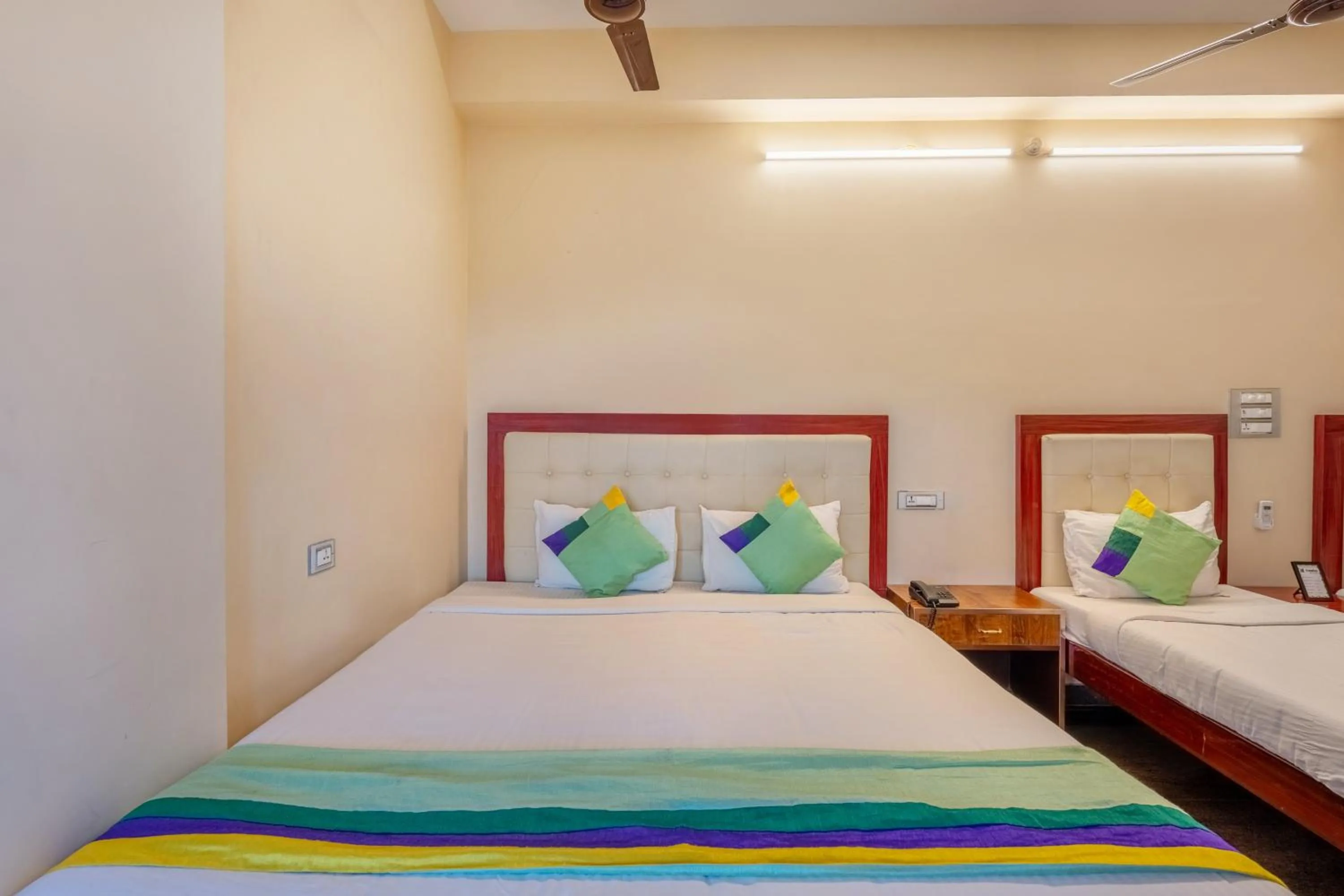 Bedroom, Bed in Treebo Grace Inn, 3 Min Walk From Promenade Beach