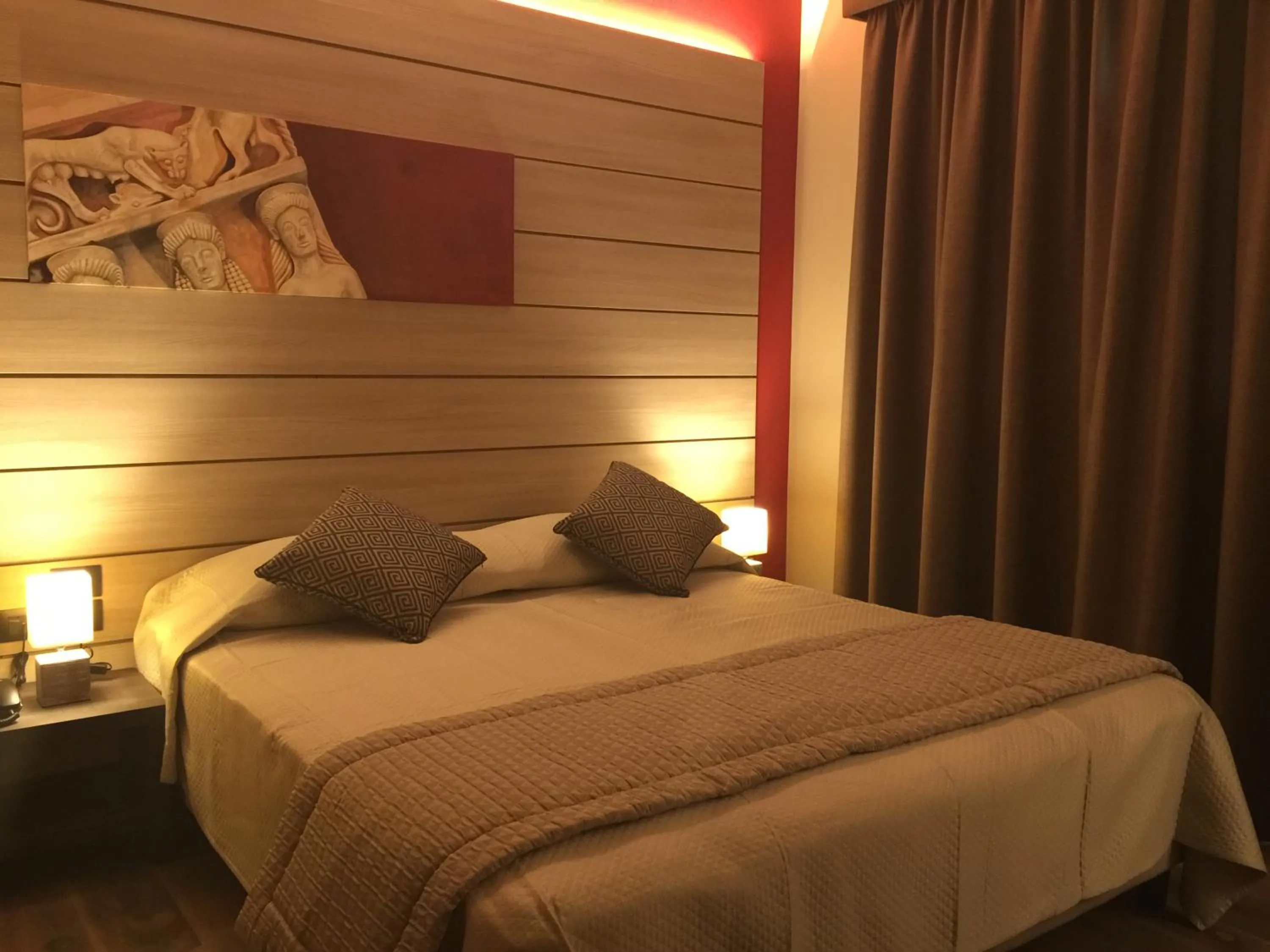 Bed in Archeo Hotel