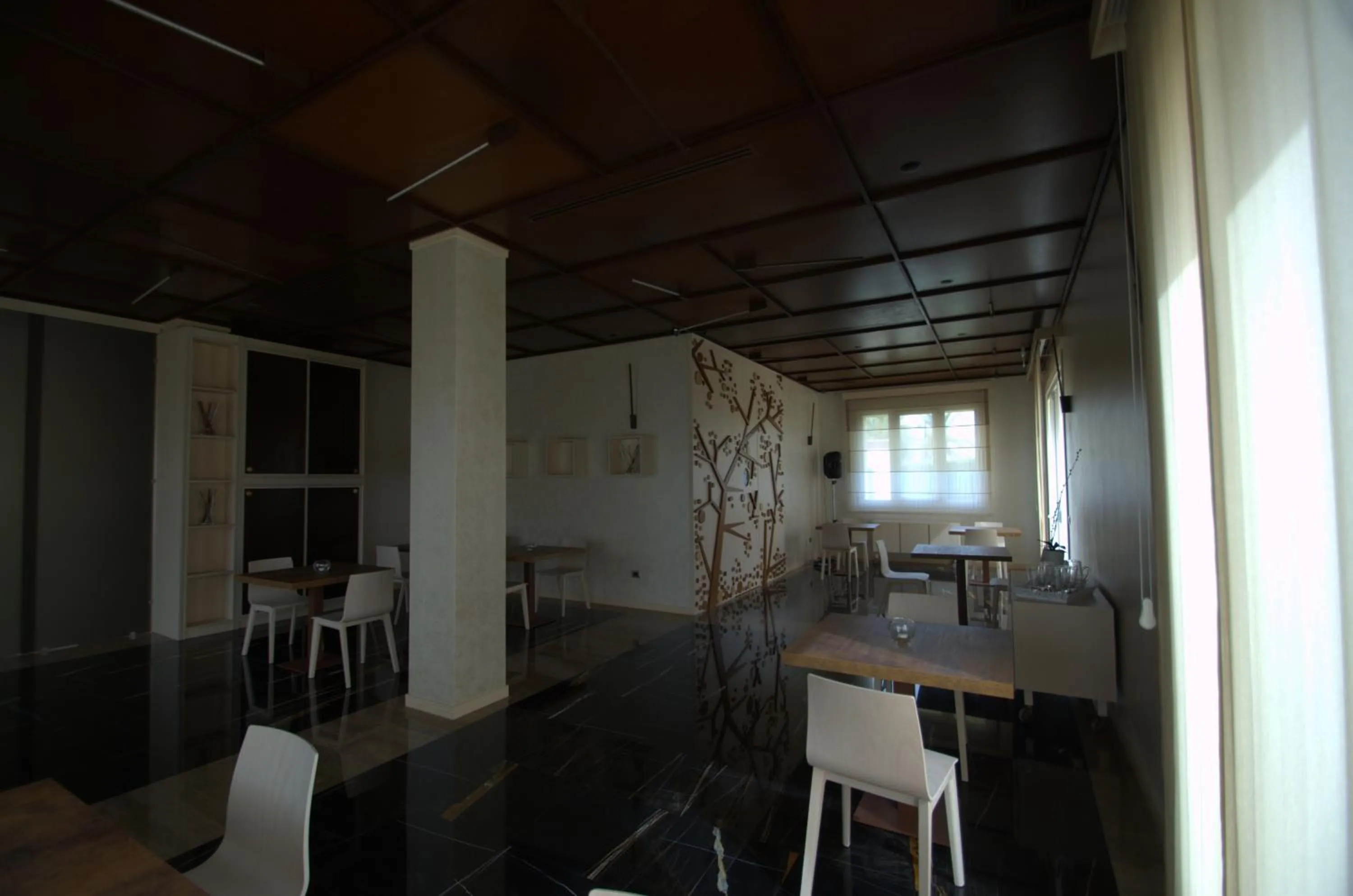 Communal lounge/ TV room in Archeo Hotel