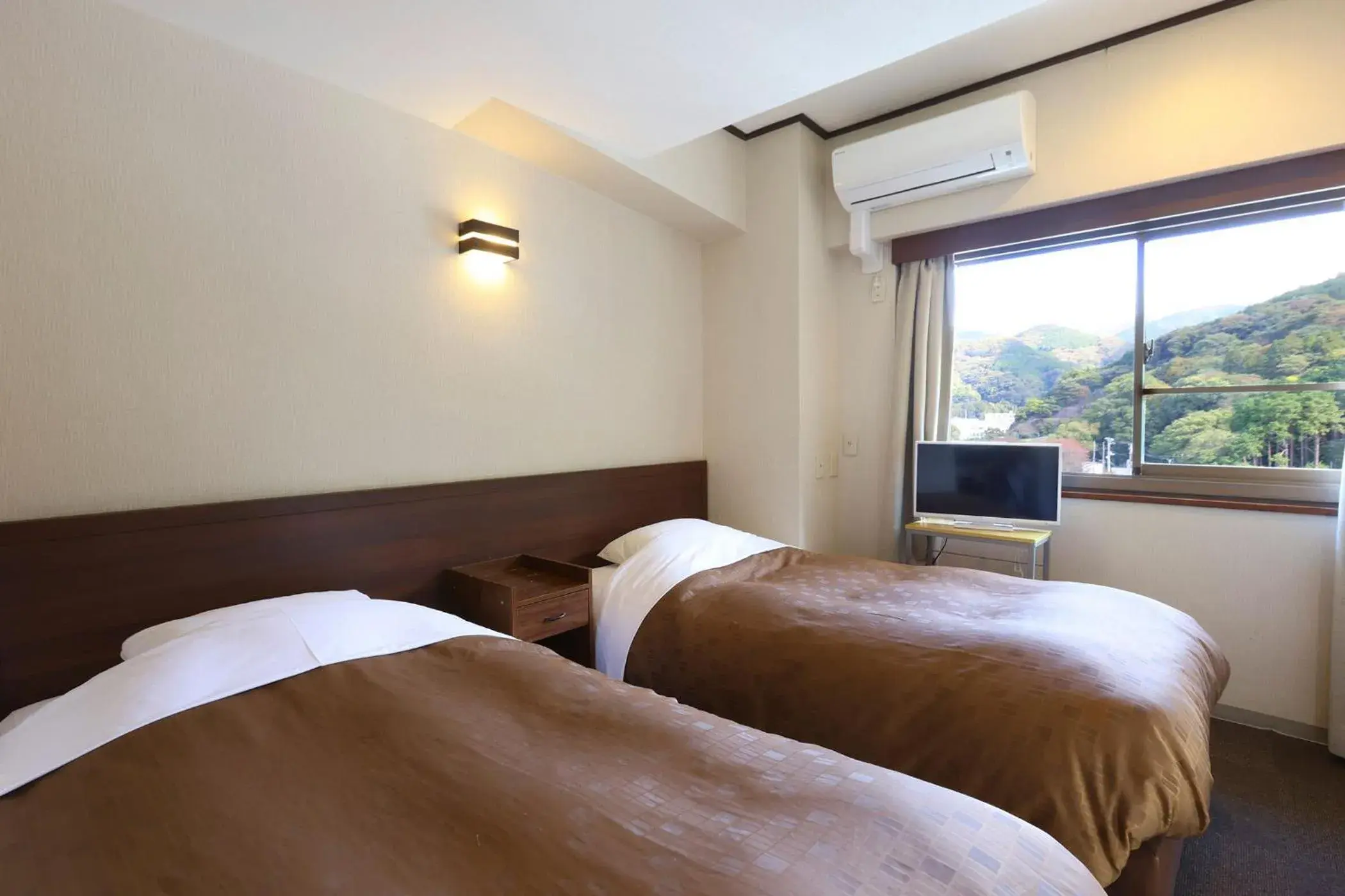 Bed in Ooedo Onsen Monogatari Toi Marine Hotel Bed in Ooedo Onsen Monogatari Toi Marine Hotel