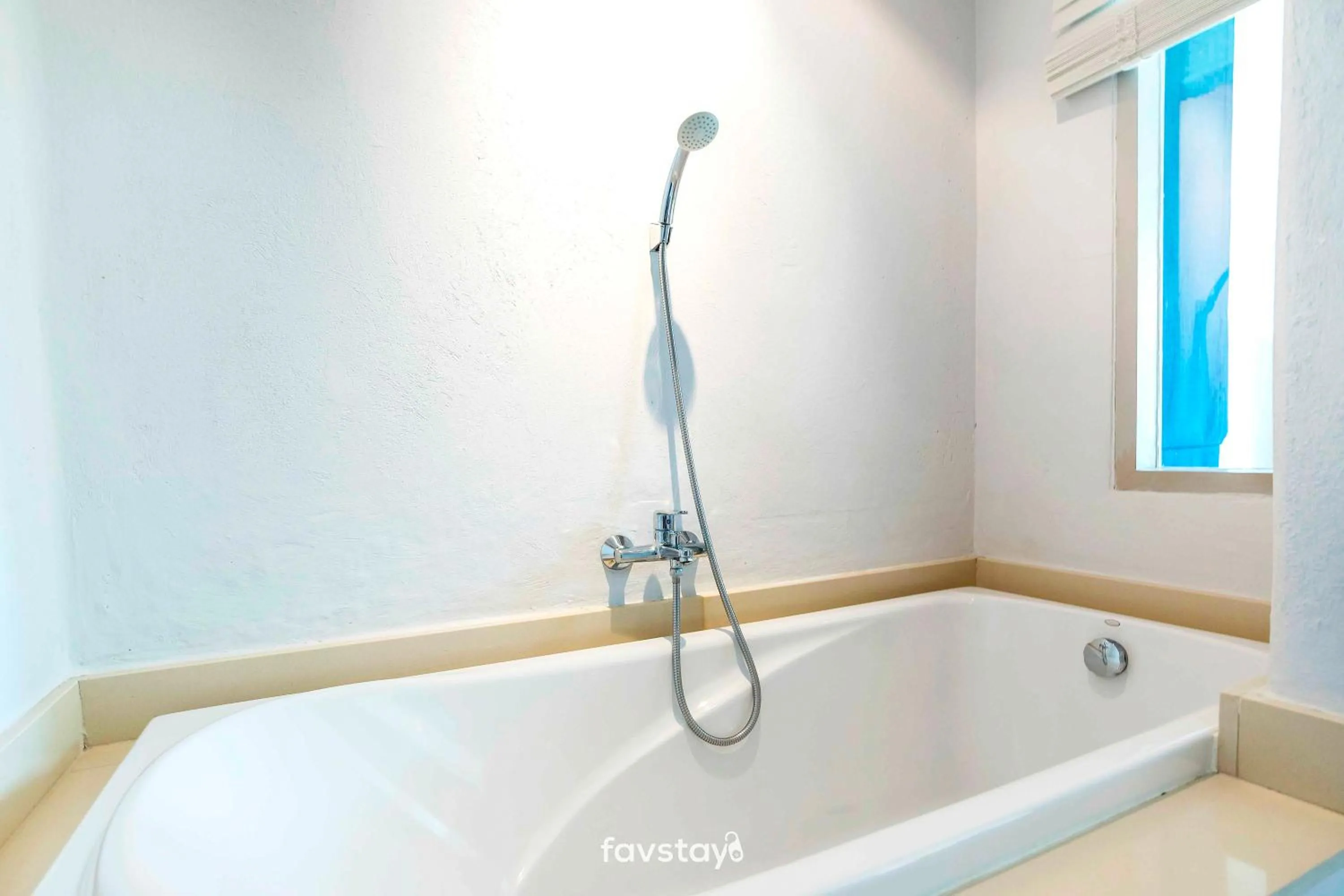 Bathroom in Chelona Hua Hin by Favstay