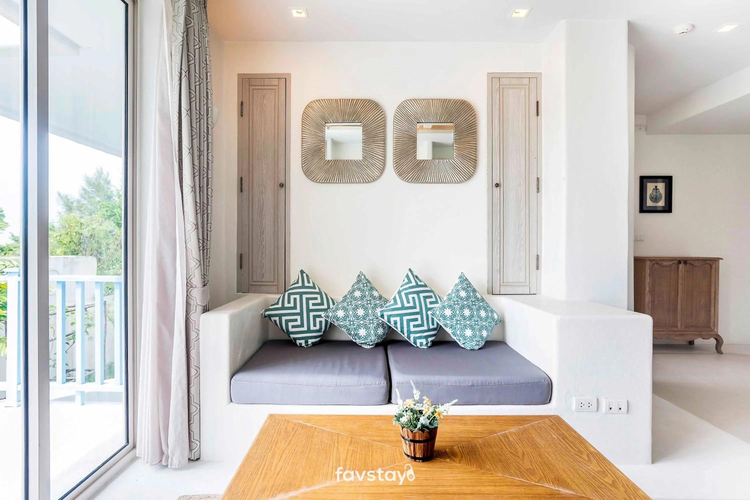 Living room in Chelona Hua Hin by Favstay