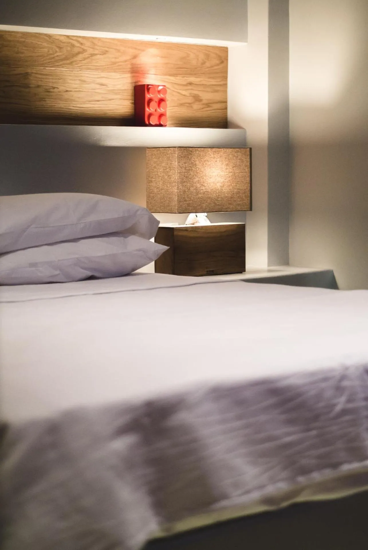 Bed in Acropolis Luxury Apartments