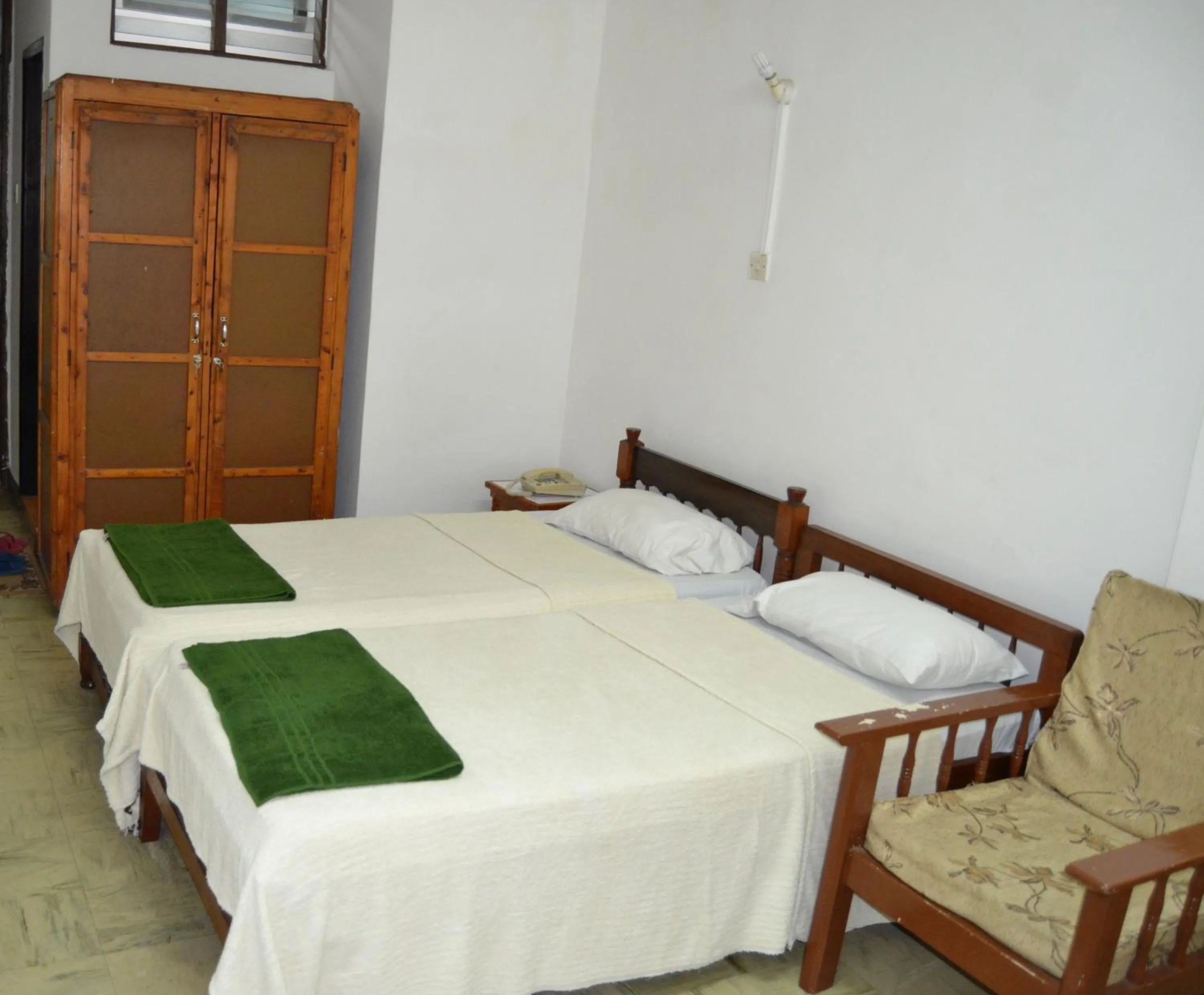 Photo of the whole room, Bed in Manson Hotel