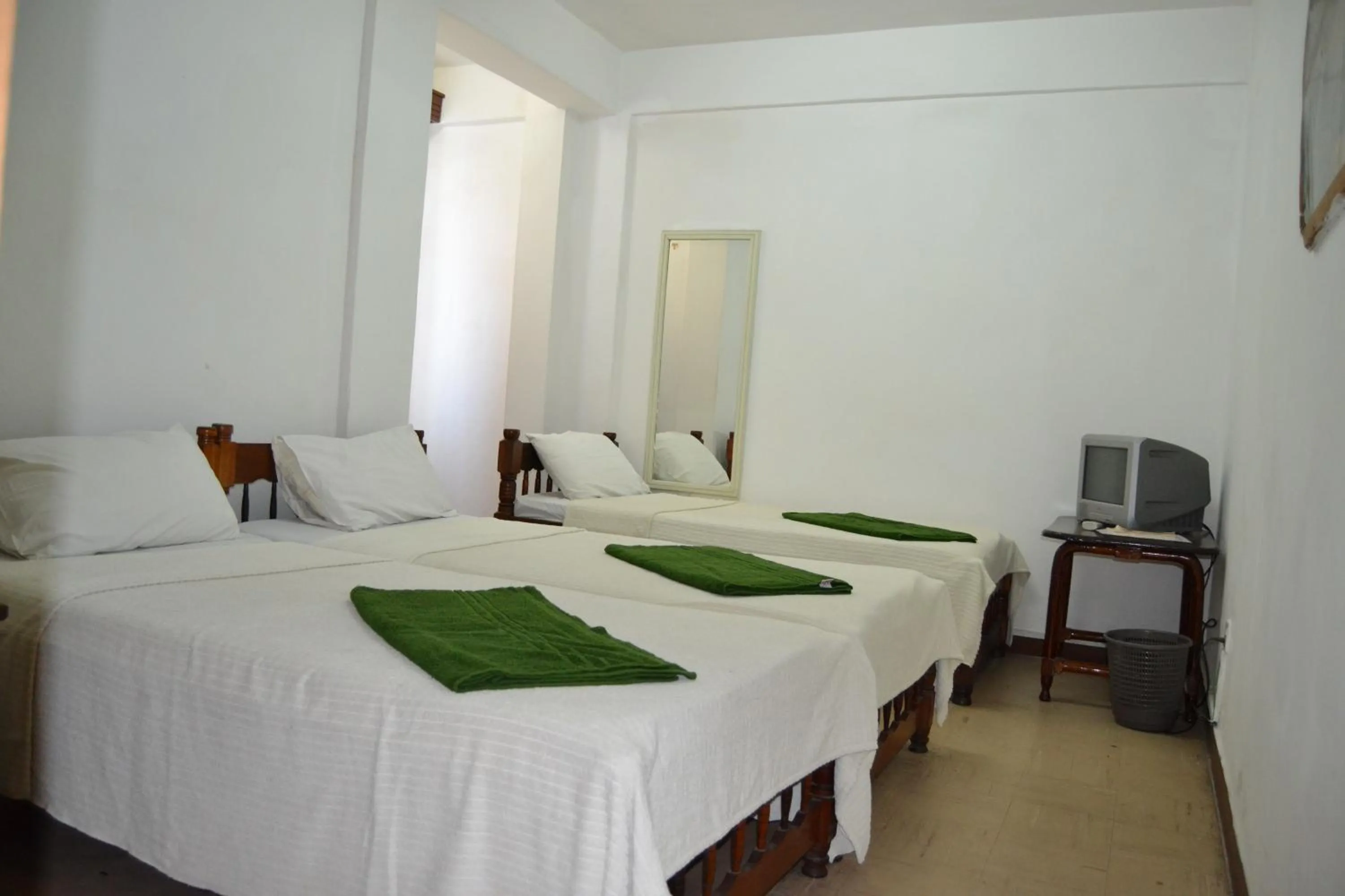 Photo of the whole room, Bed in Manson Hotel