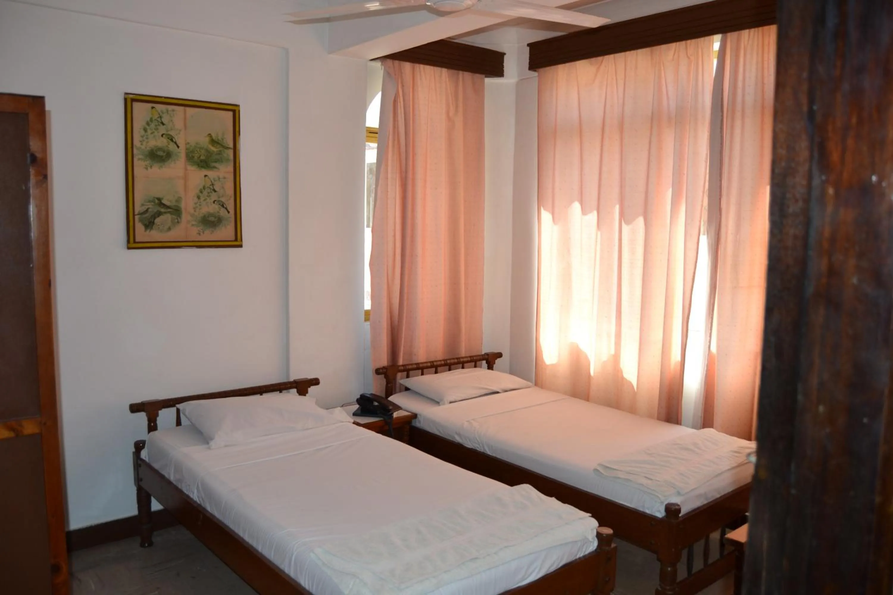 Photo of the whole room, Bed in Manson Hotel